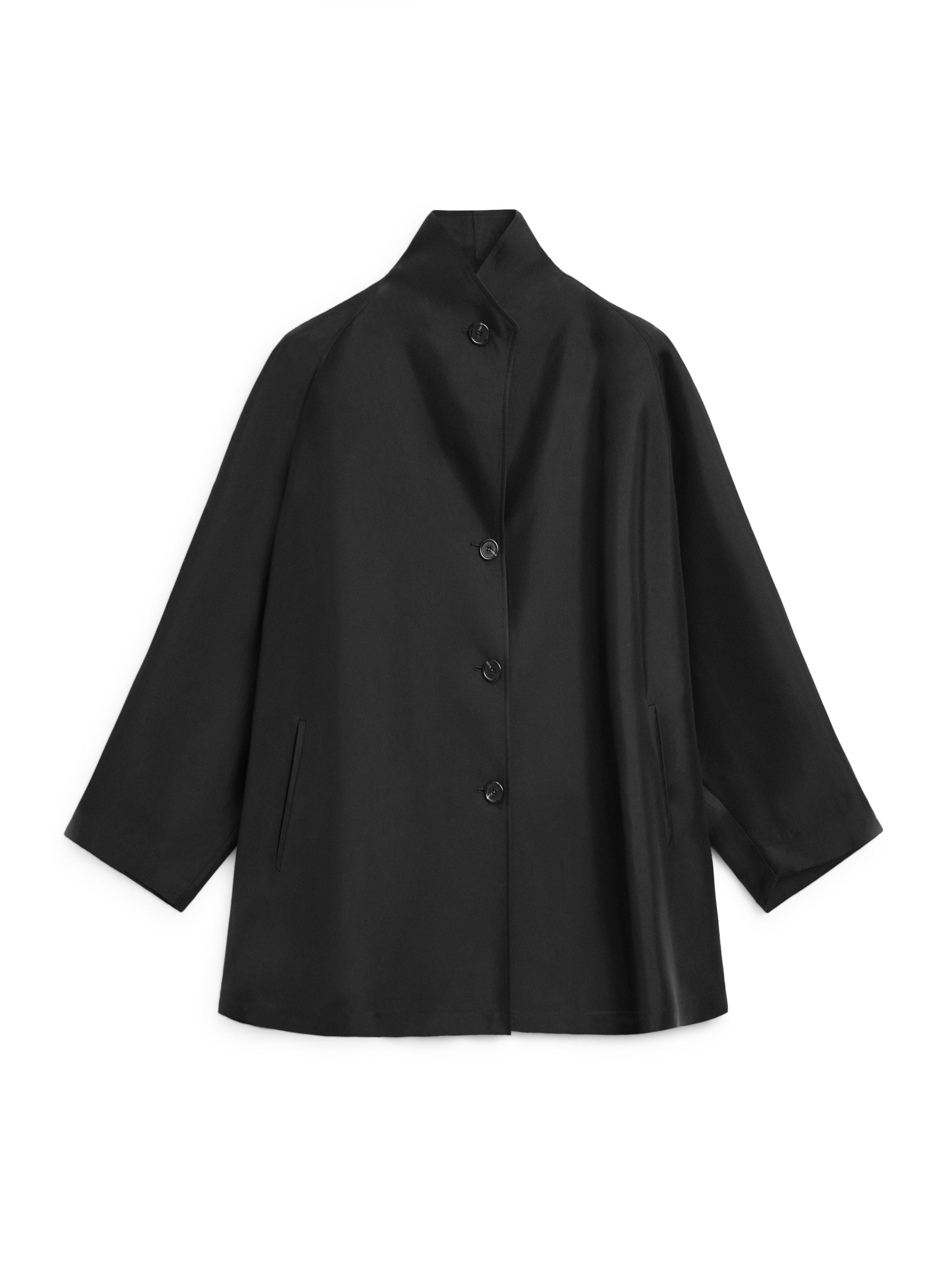 Flowing voluminous cape with button details — BLACK
