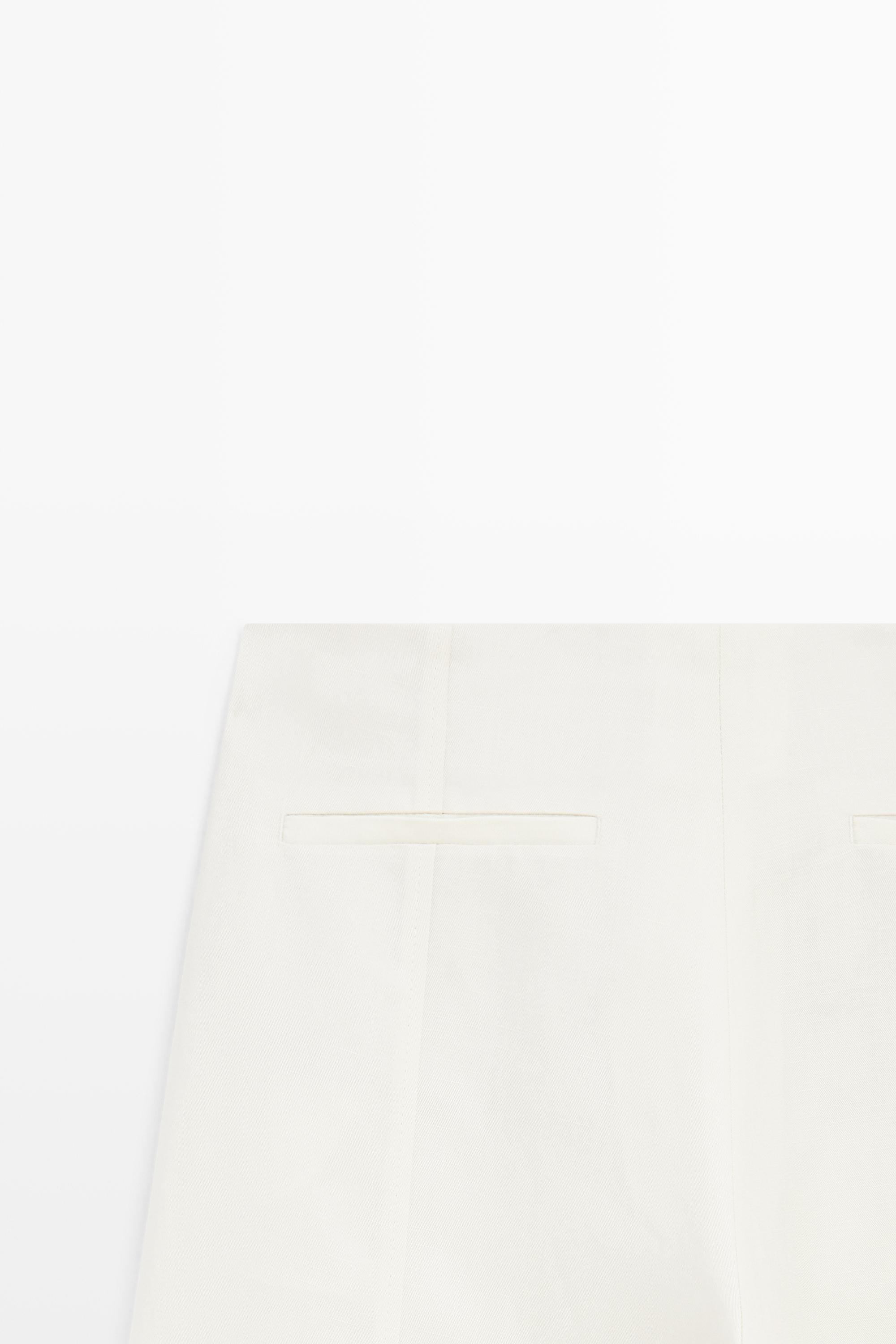 Flowing barrel fit trousers — OFF WHITE