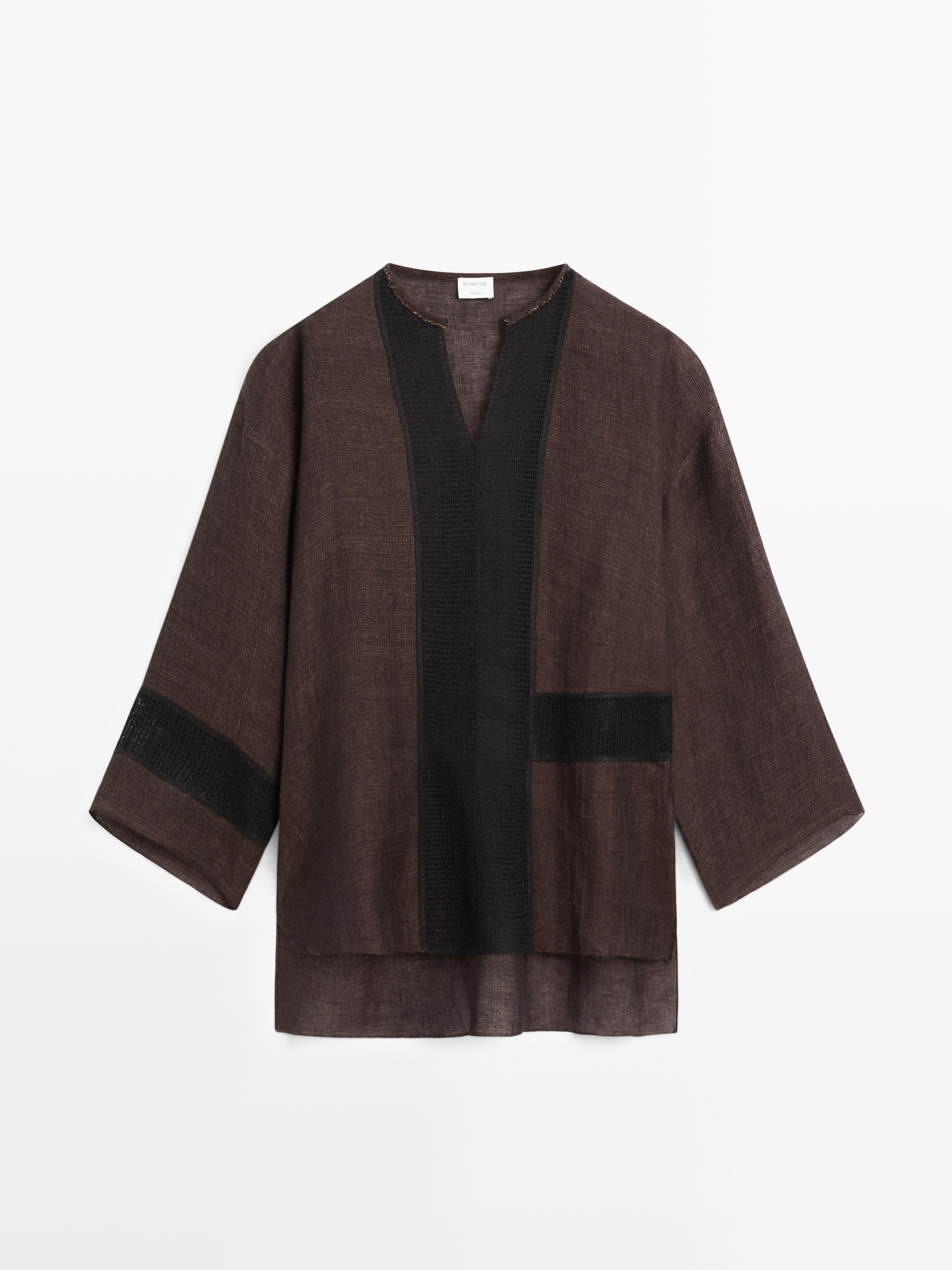 Flowing oversize linen blend blouse with lace trim