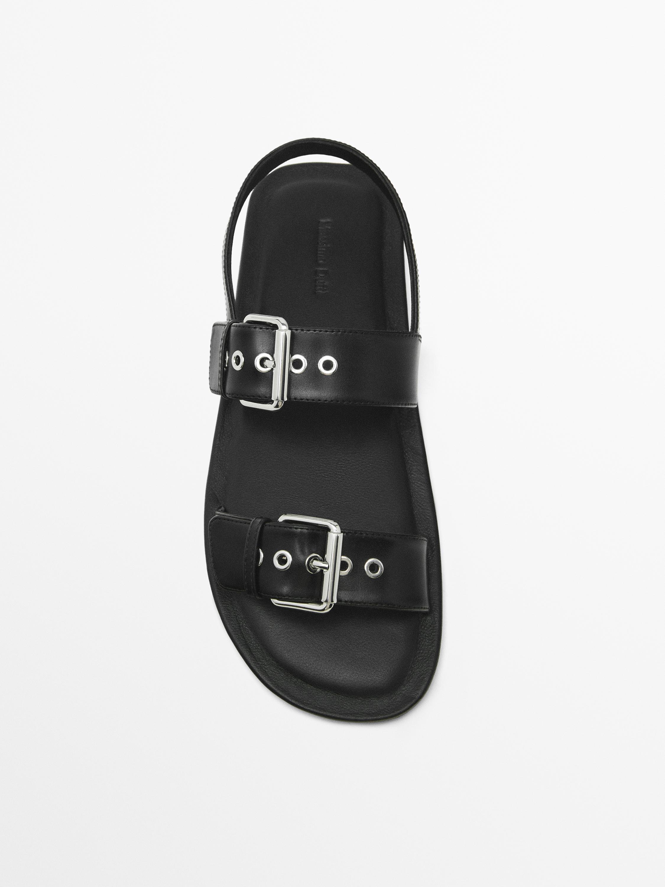 Flat slider sandals with buckles