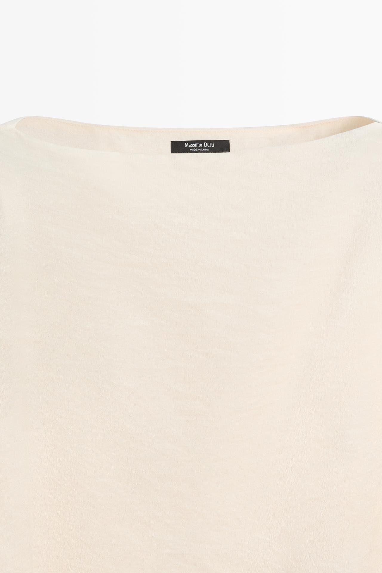 Asymmetric cape-style flowing blouse — Off white