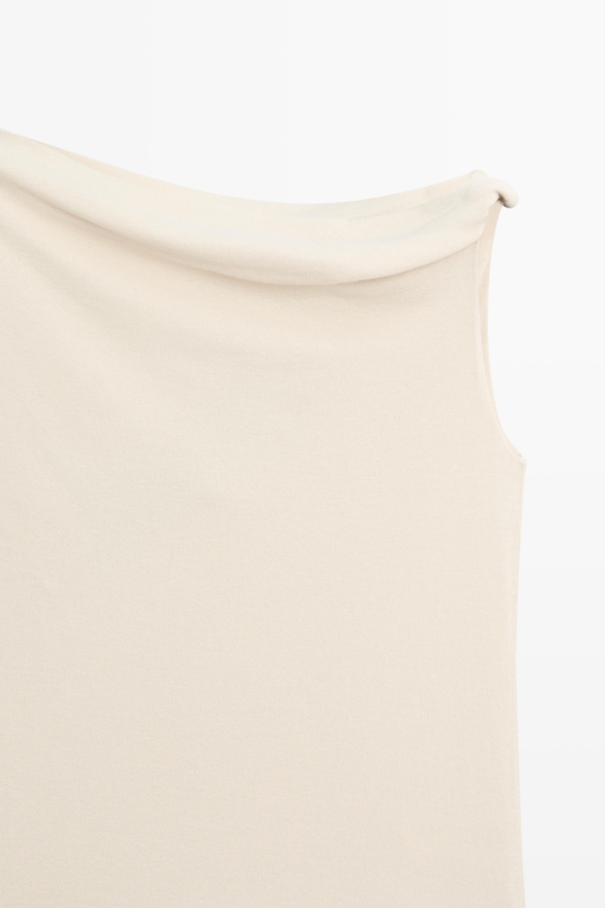 Asymmetric drop sleeve top — SAND