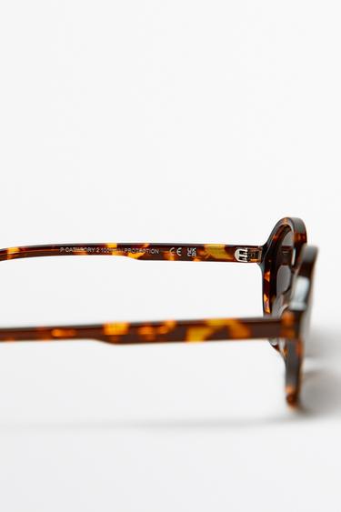 Oval tortoiseshell-effect sunglasses — BROWN 5