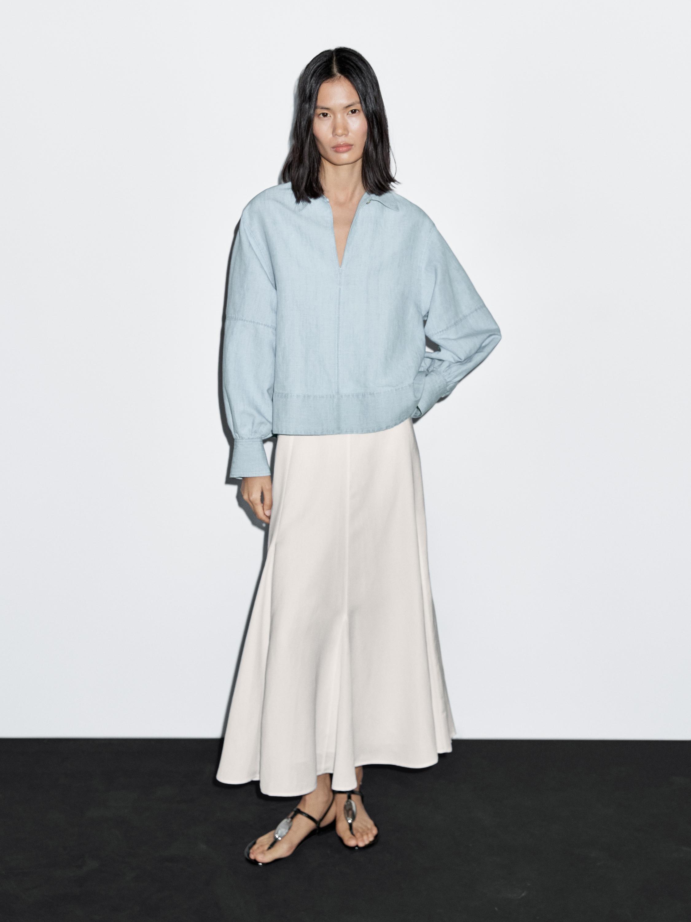 Oversize denim blouse with puff sleeves