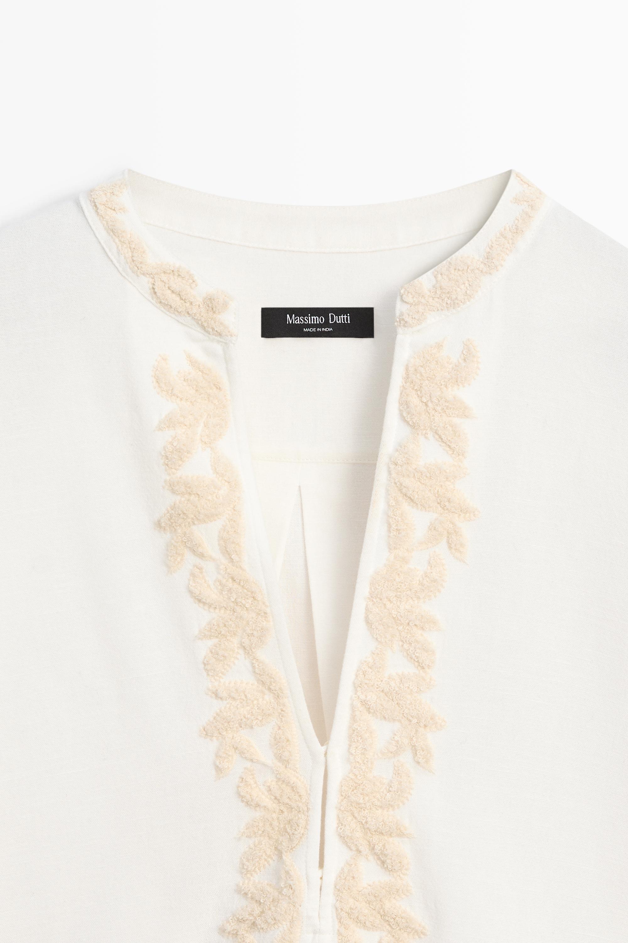 Flowing oversize blouse with stand collar and embroidery — CREAM
