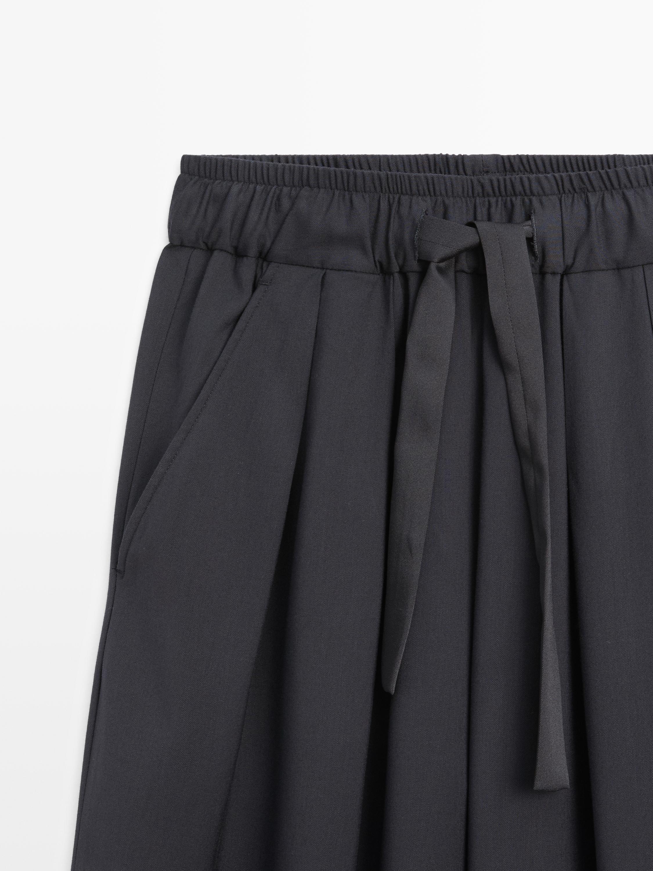Voluminous wide-leg pleated trousers — NAVY BLUE
