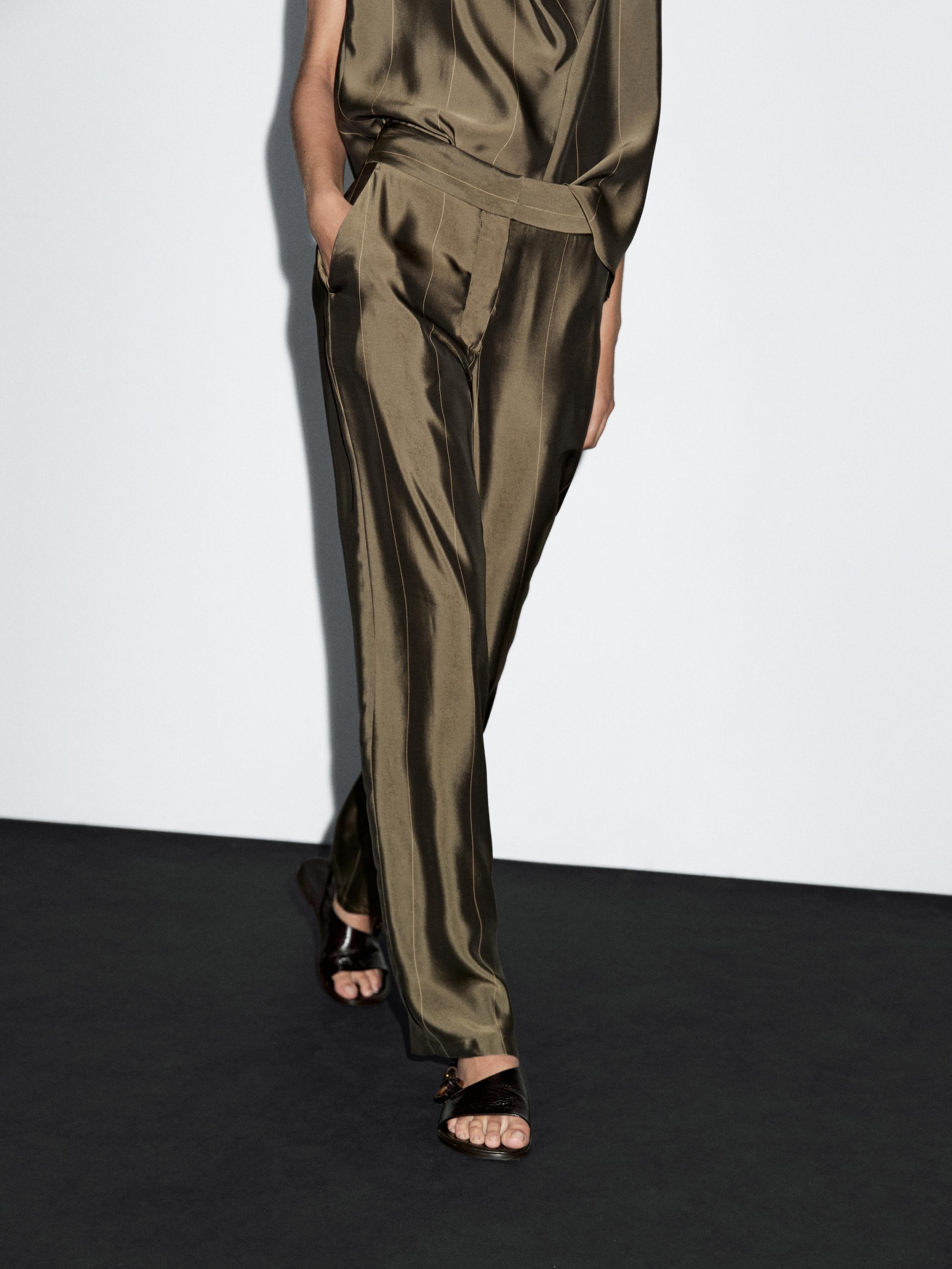 Pantalón fluido detalle rayas