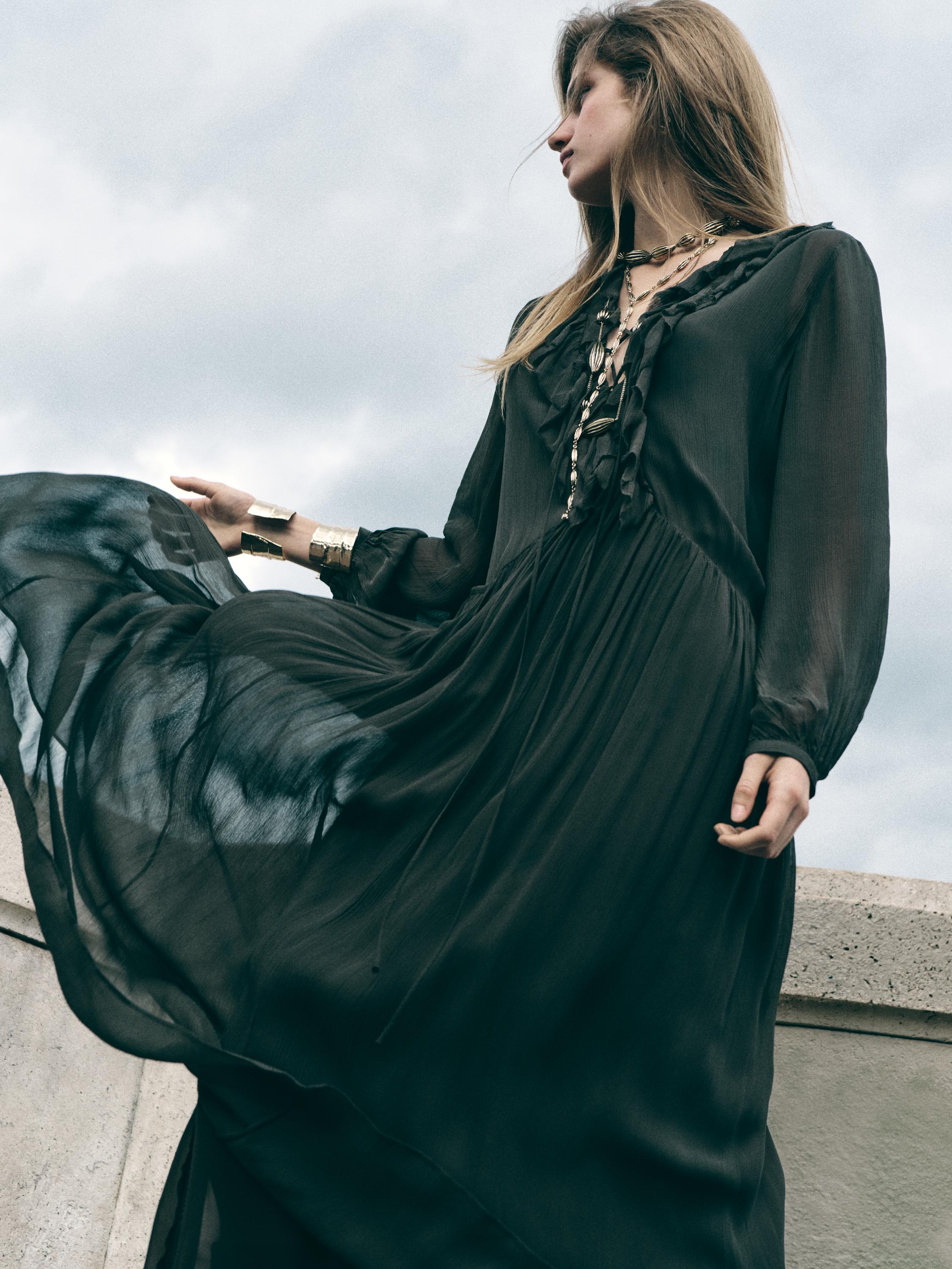 Long flowing dress with ruffle detail