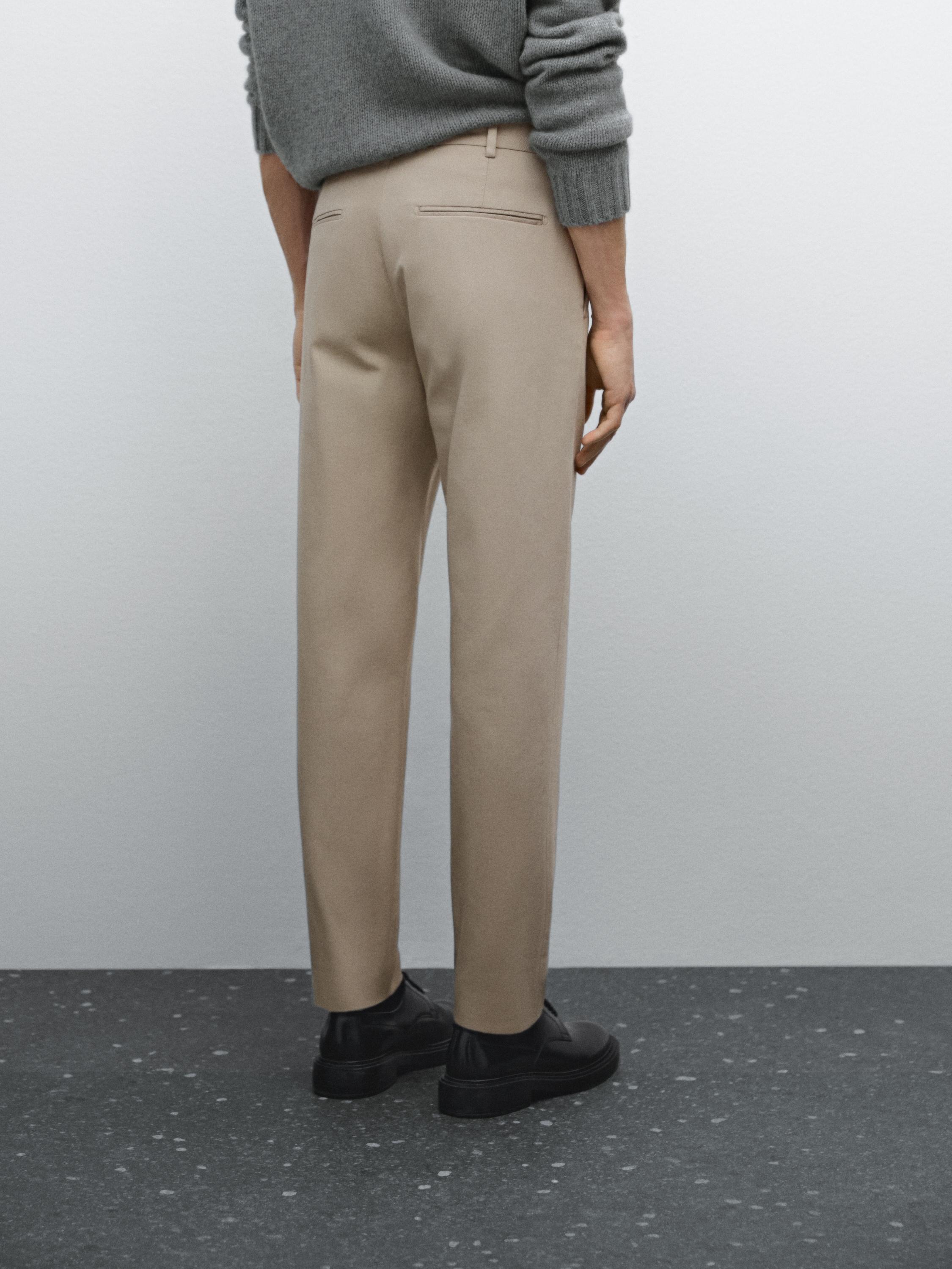 Cotton blend textured slim fit trousers