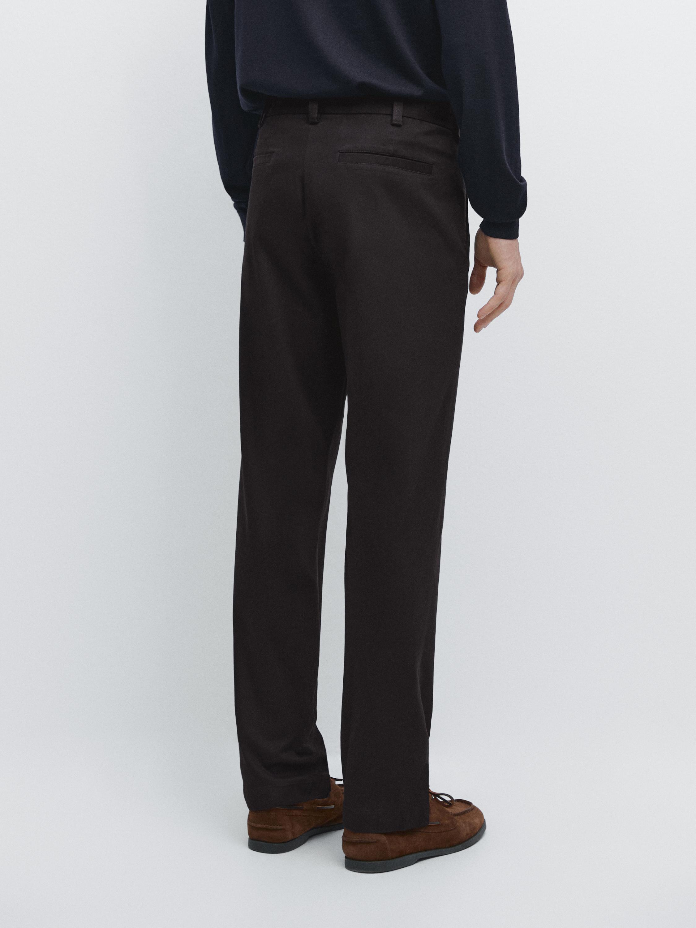 Tapered fit micro textured trousers — NAVY BLUE