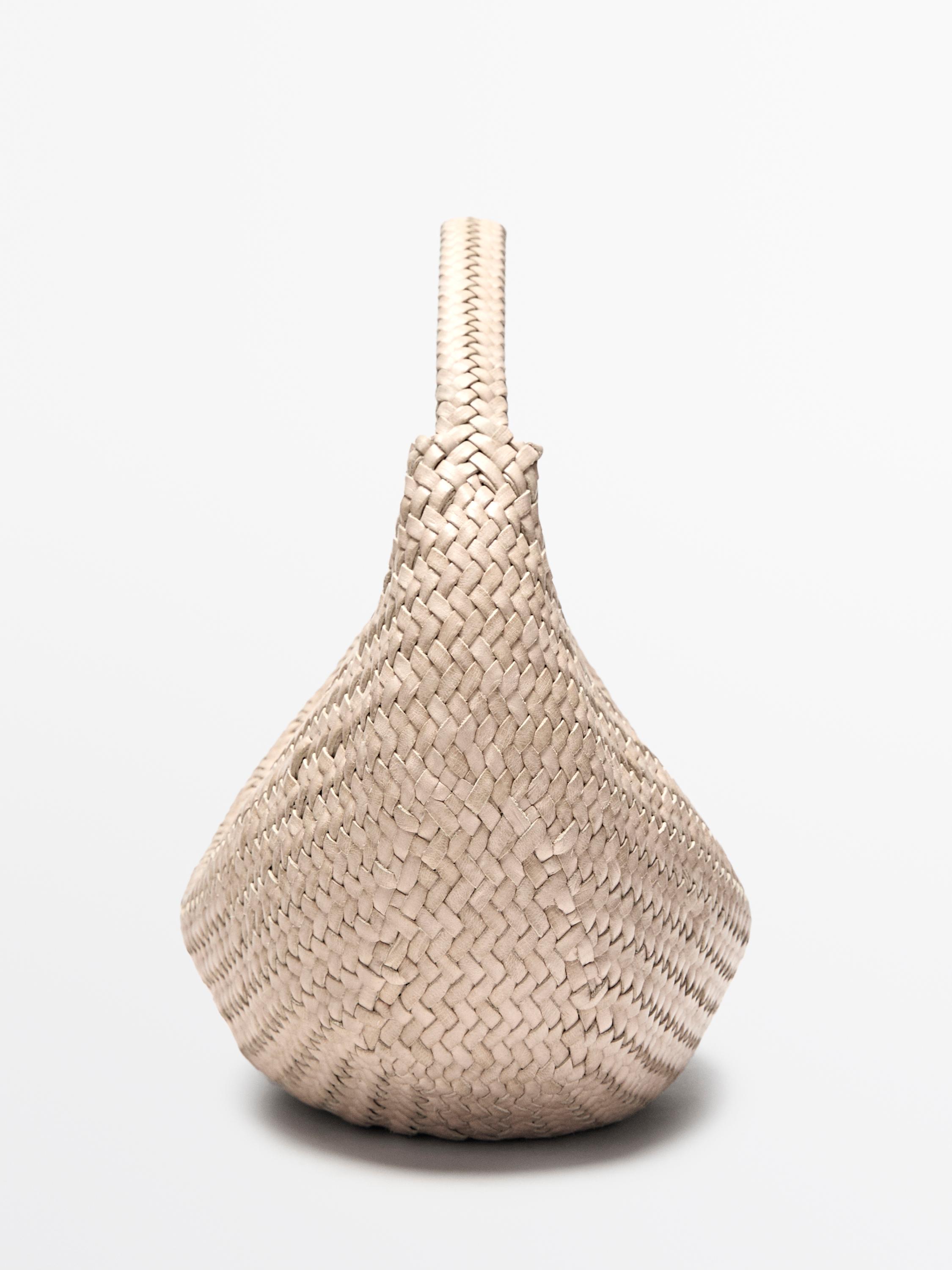 Braided leather half-moon bag — CREAM