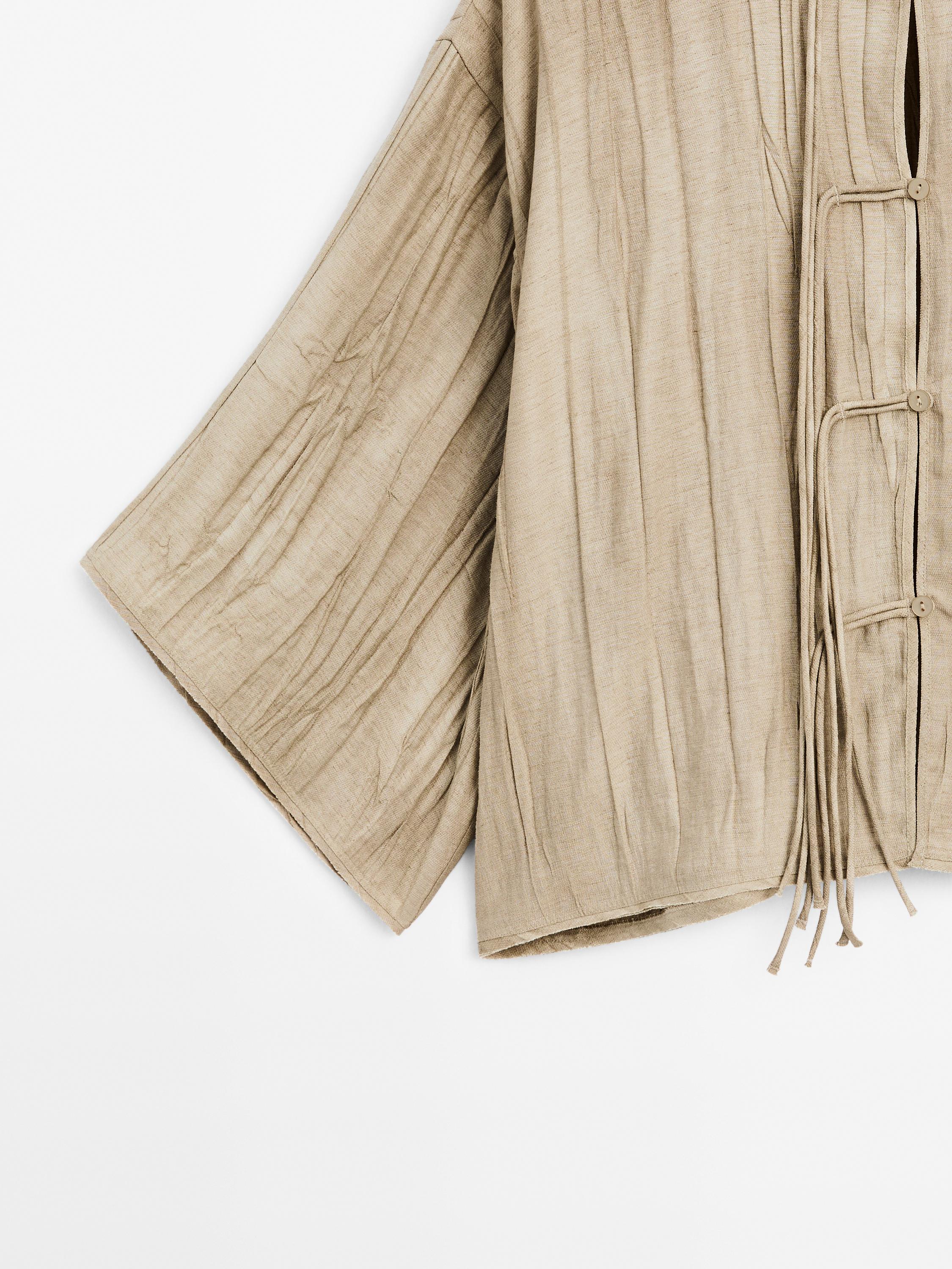 Flowing kimono with tie detail