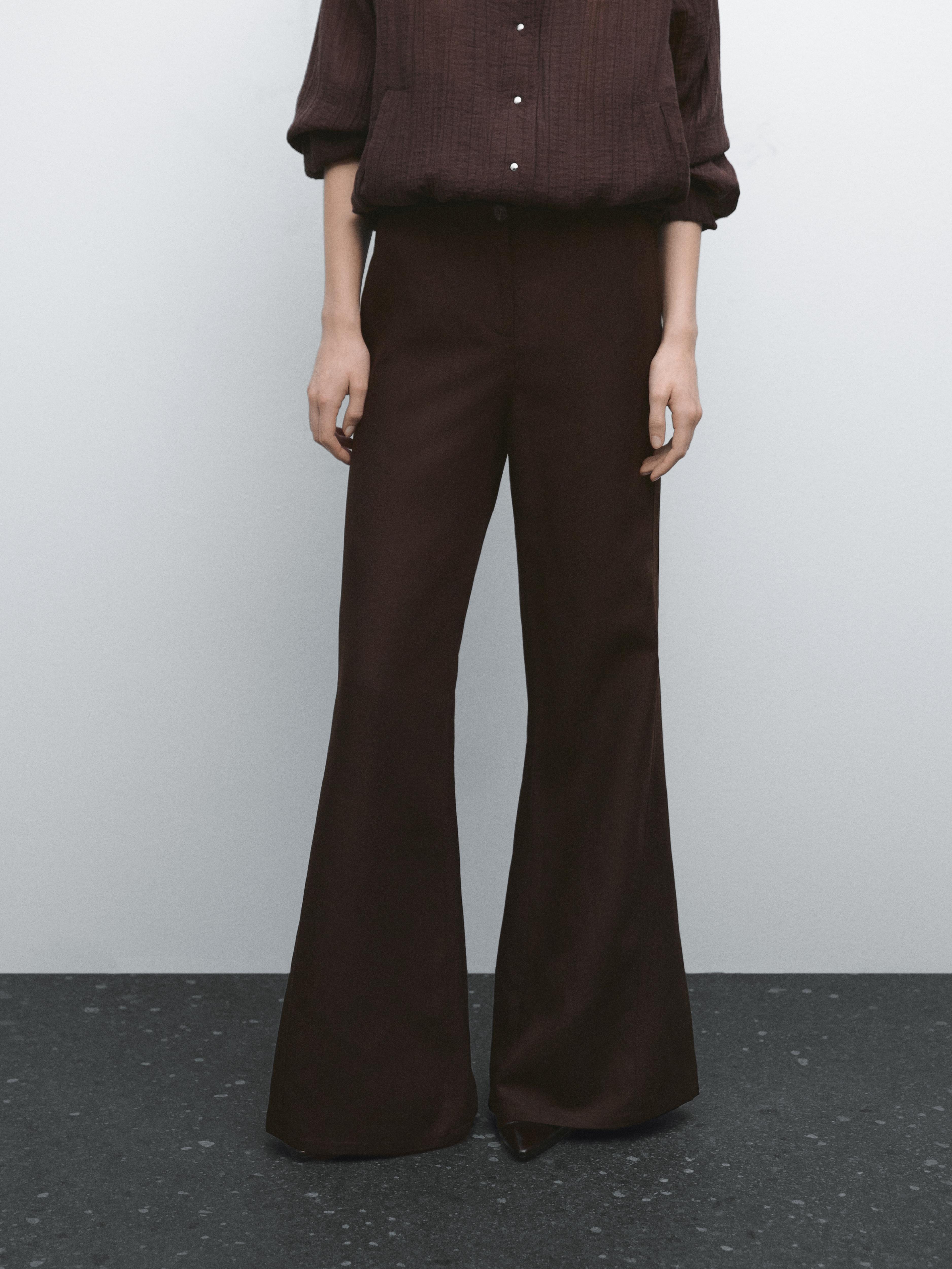 Flared trousers with seams
