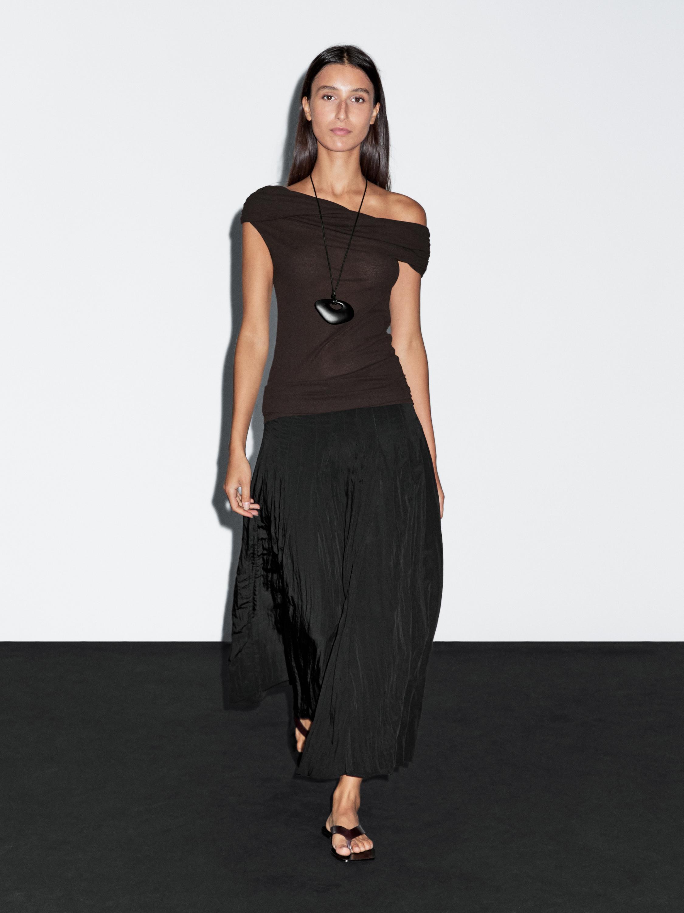 100% cotton top with asymmetric neckline