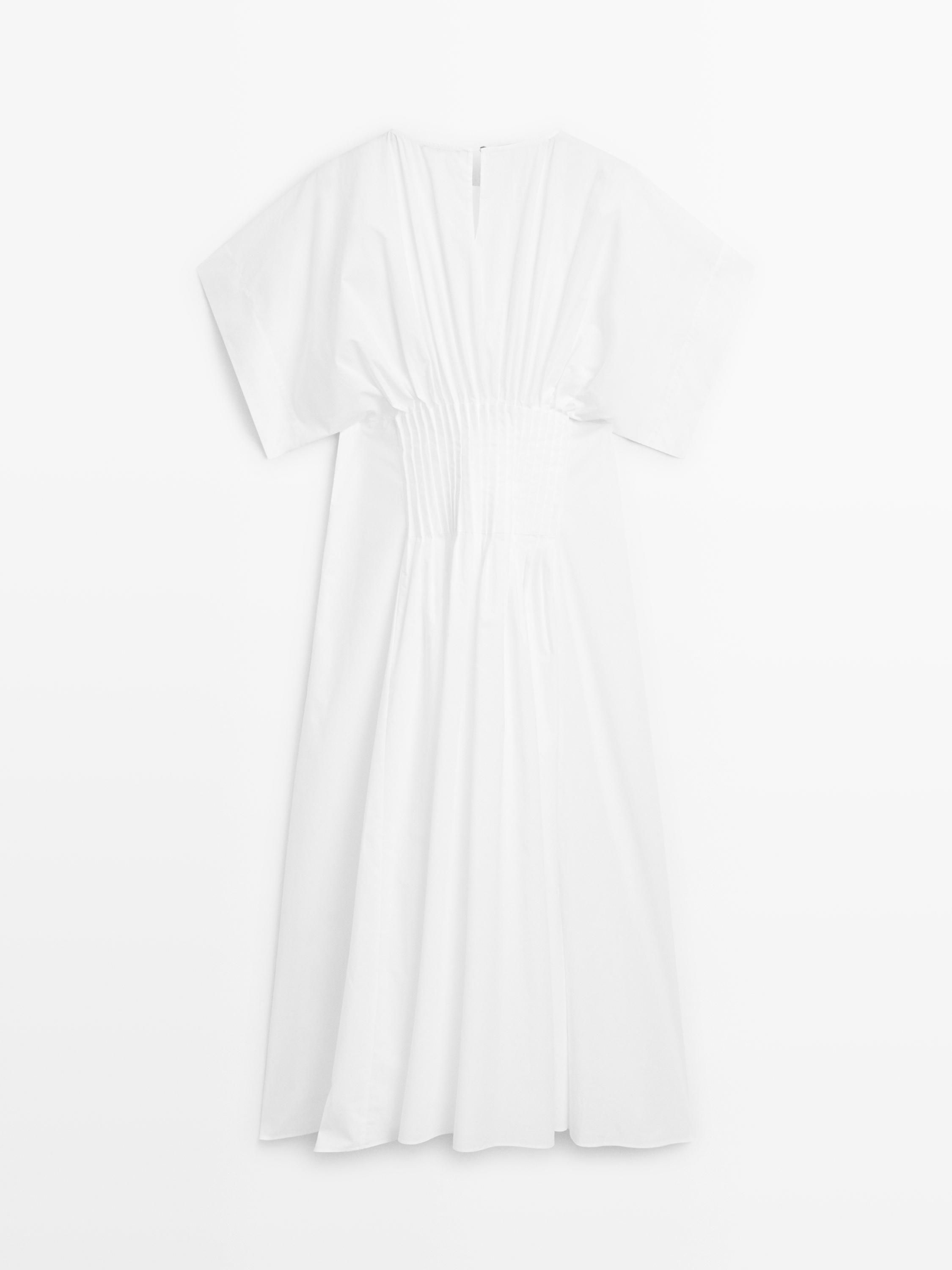 Robe longue plissée