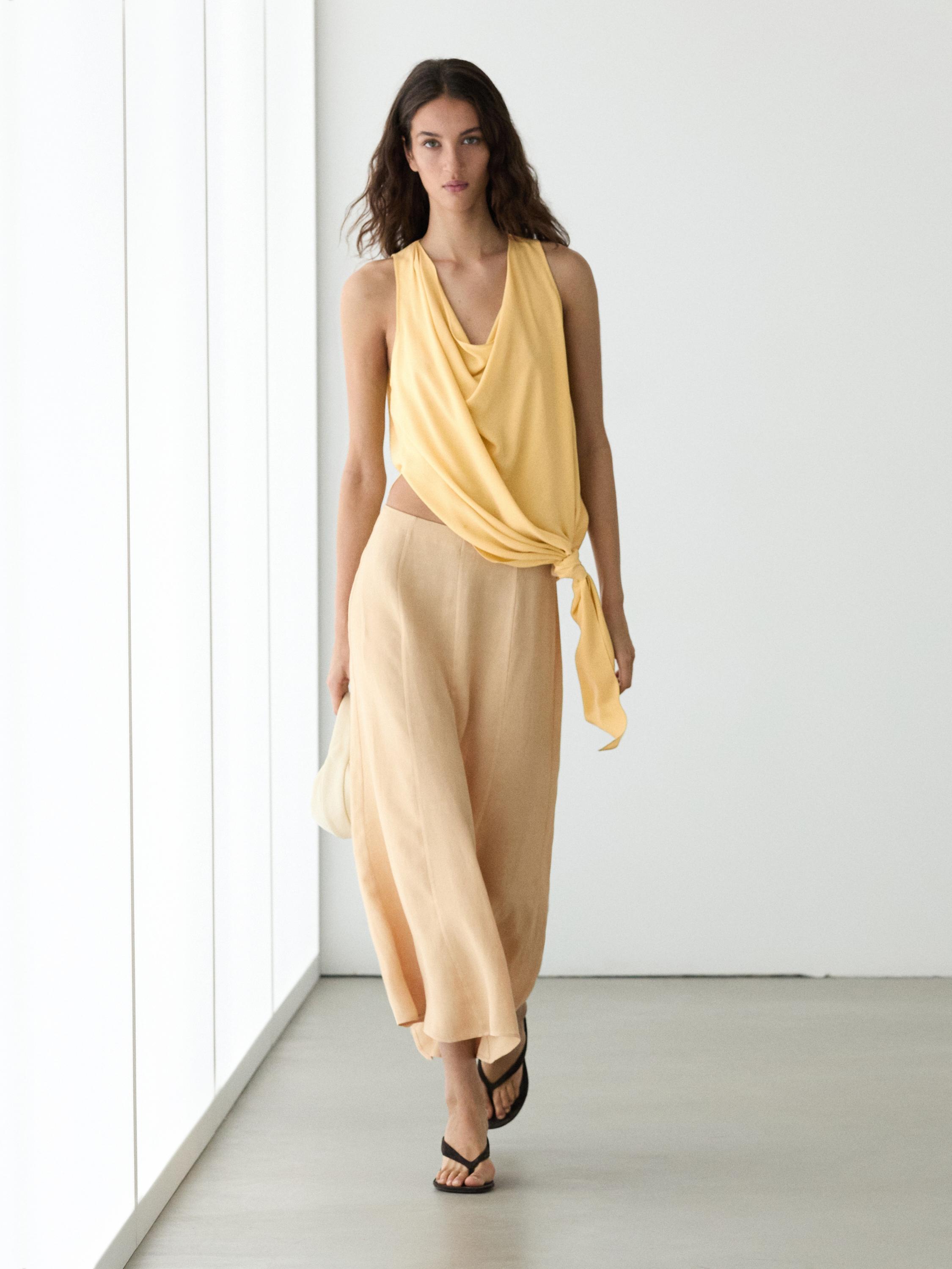 Flowing flared skirt — PALE YELLOW