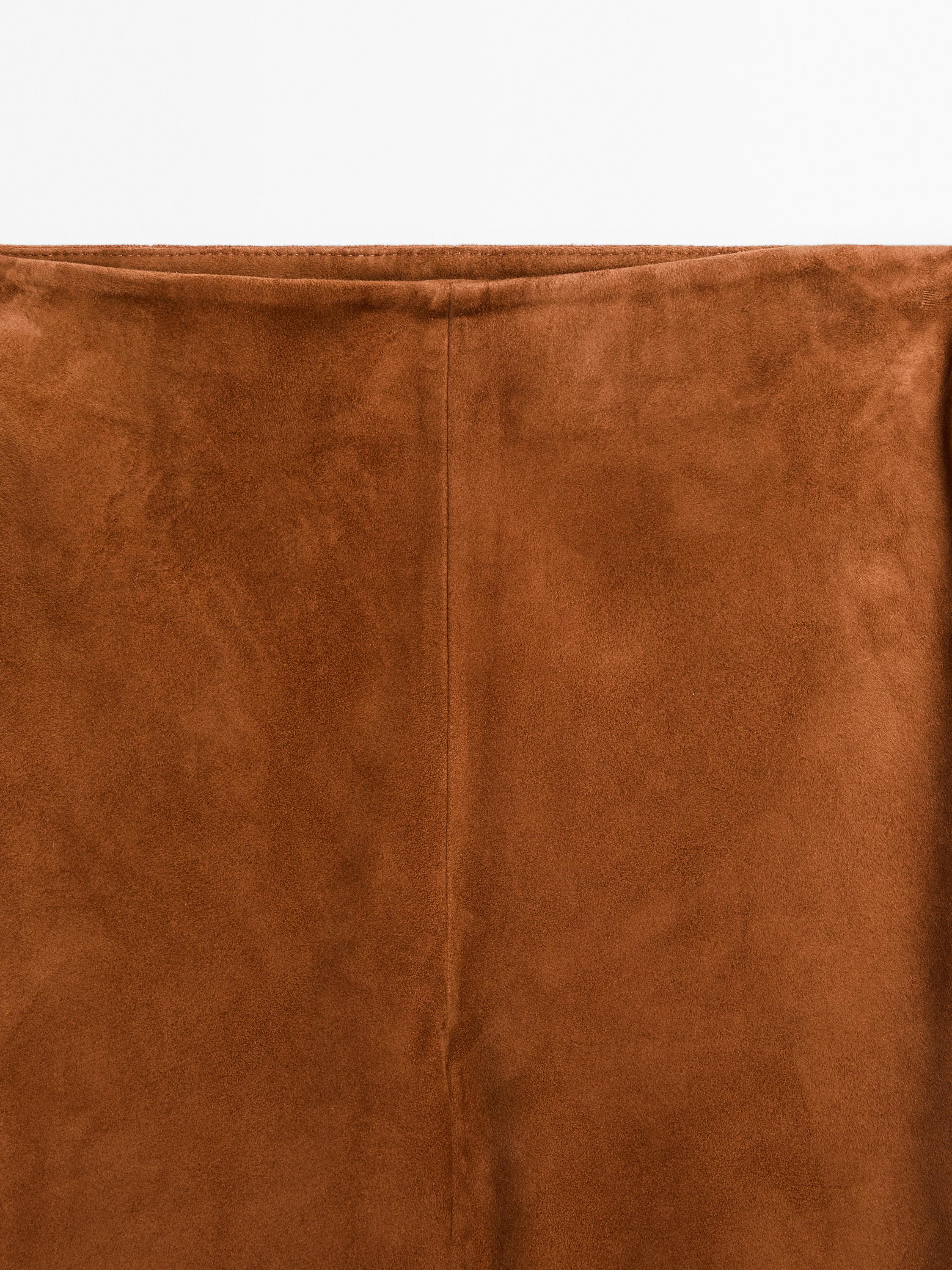 Pantalon flare en cuir finition daim