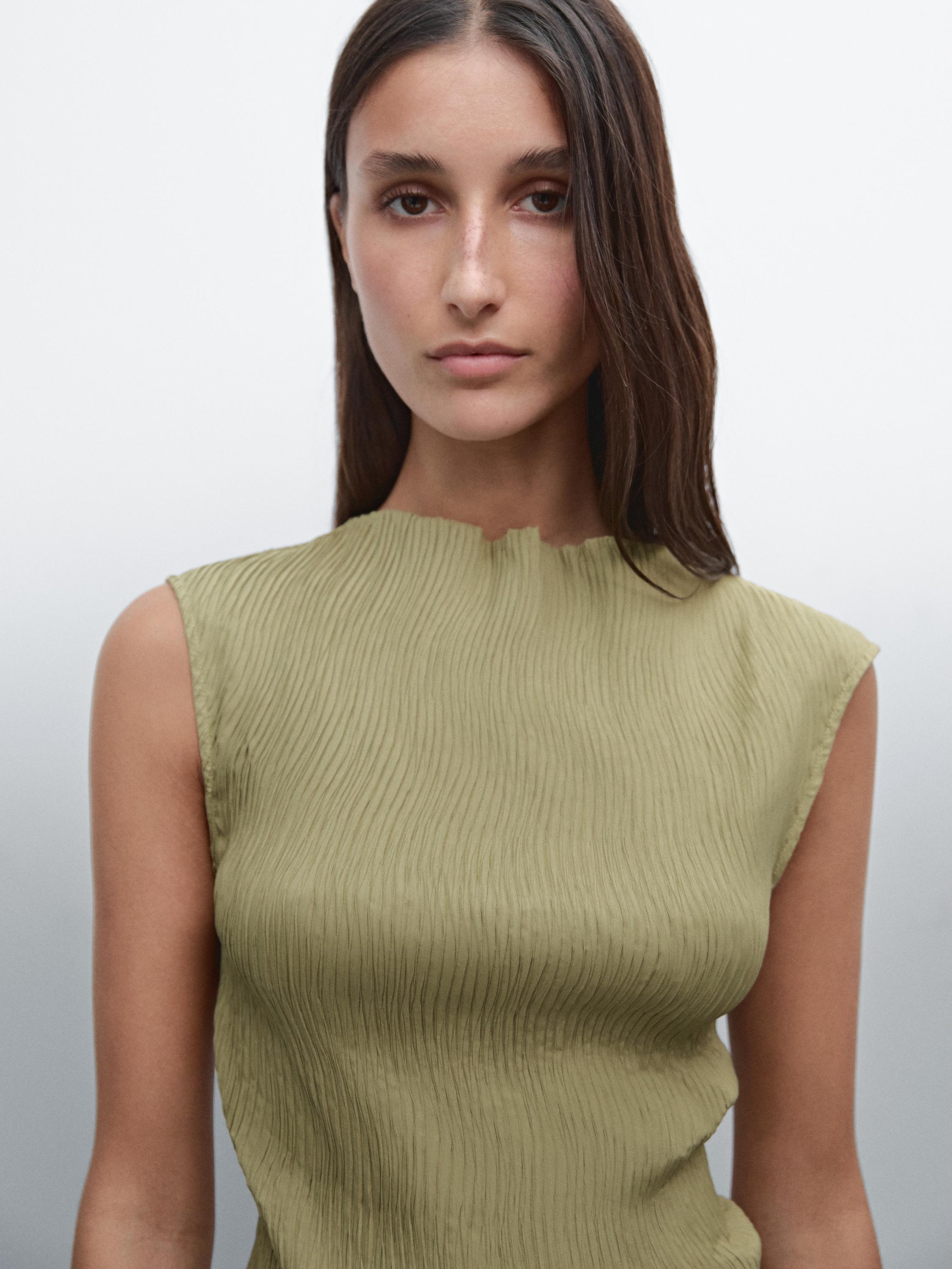 Creased-effect pleated top