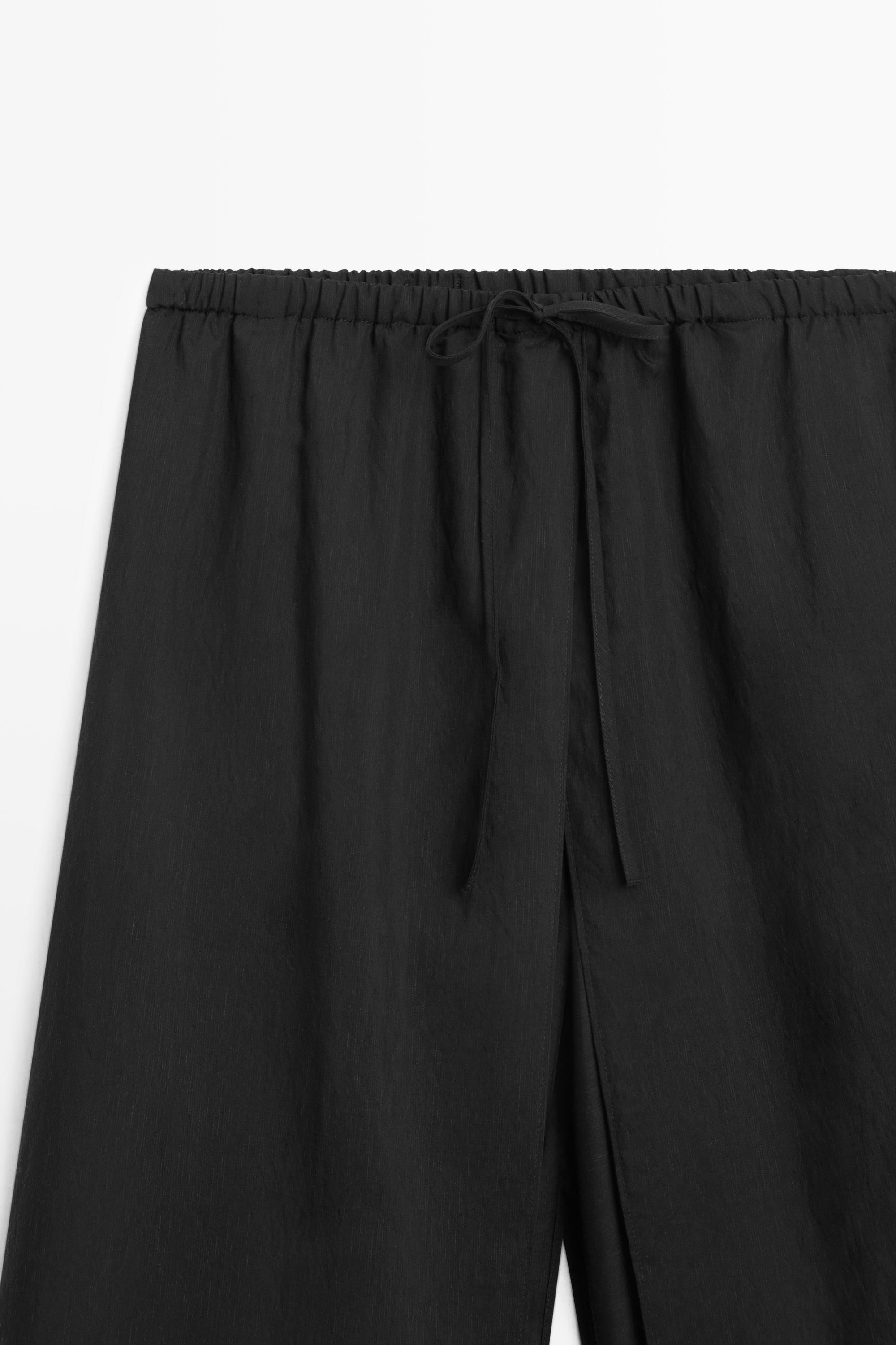 Double-layer pants with tie detail — BLACK