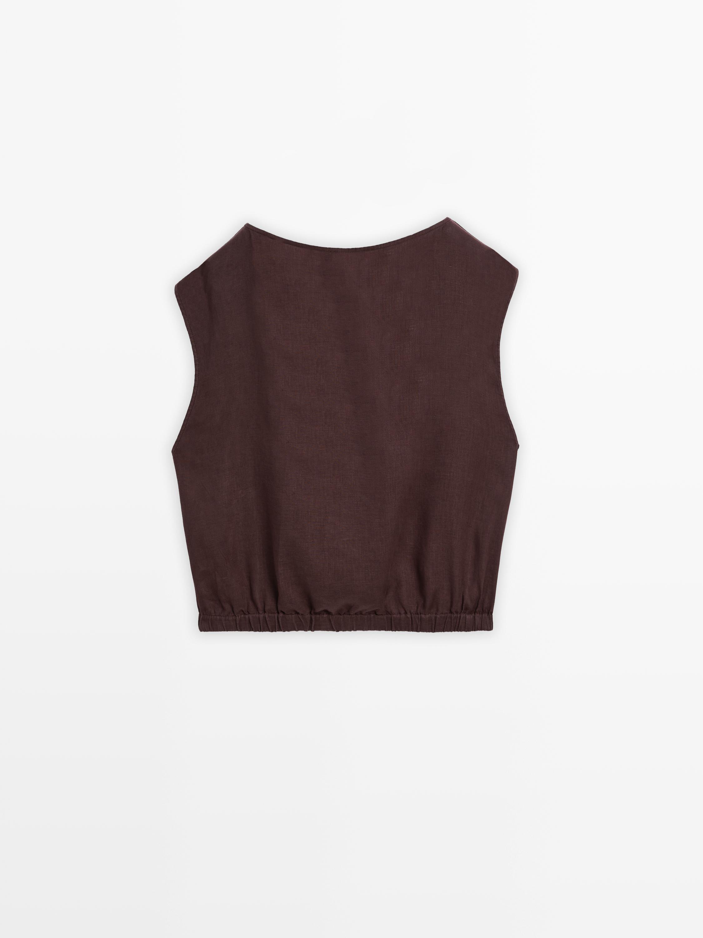 Linen blouse with elasticated hem