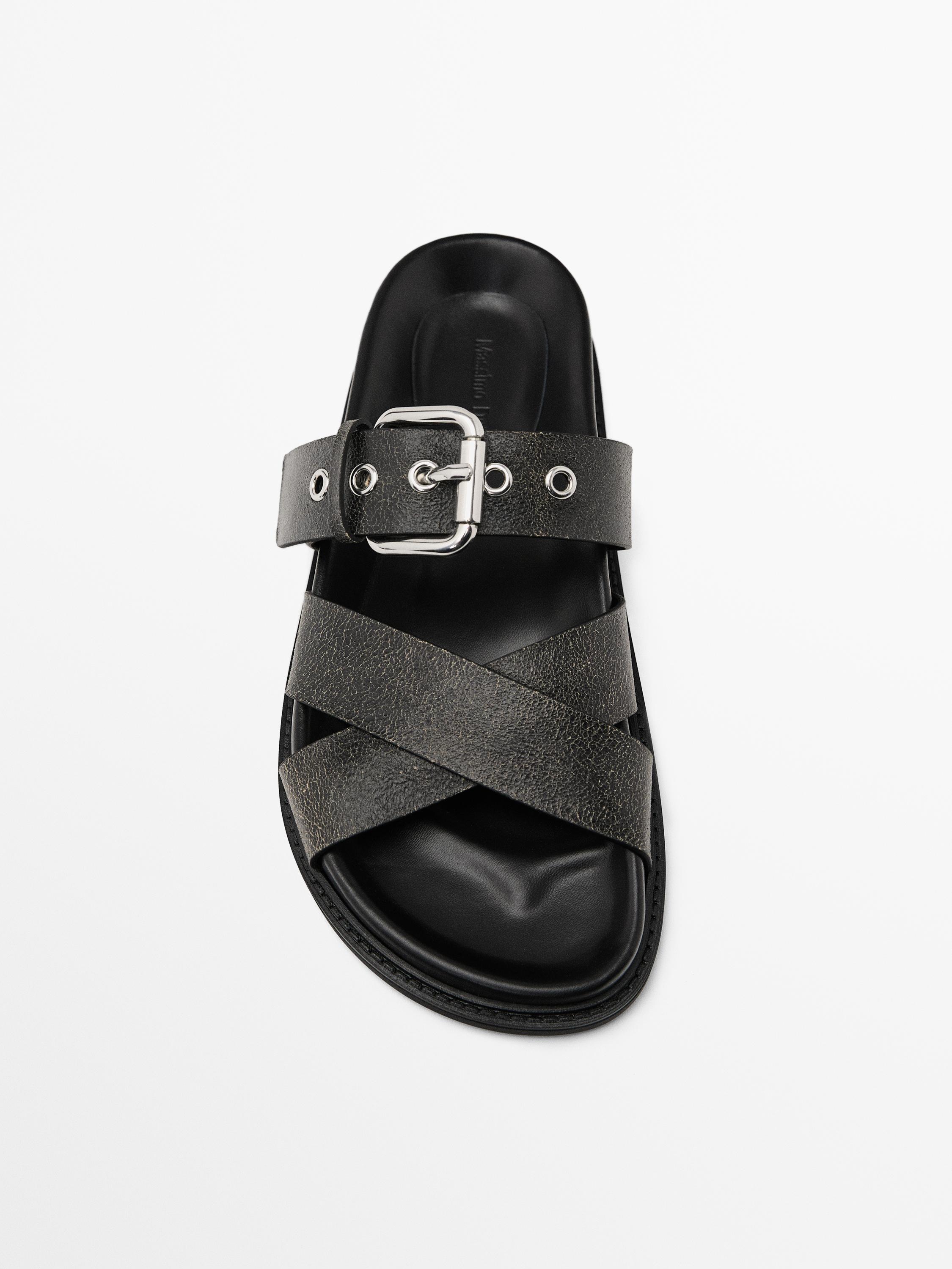 Crackled leather criss-cross sandals