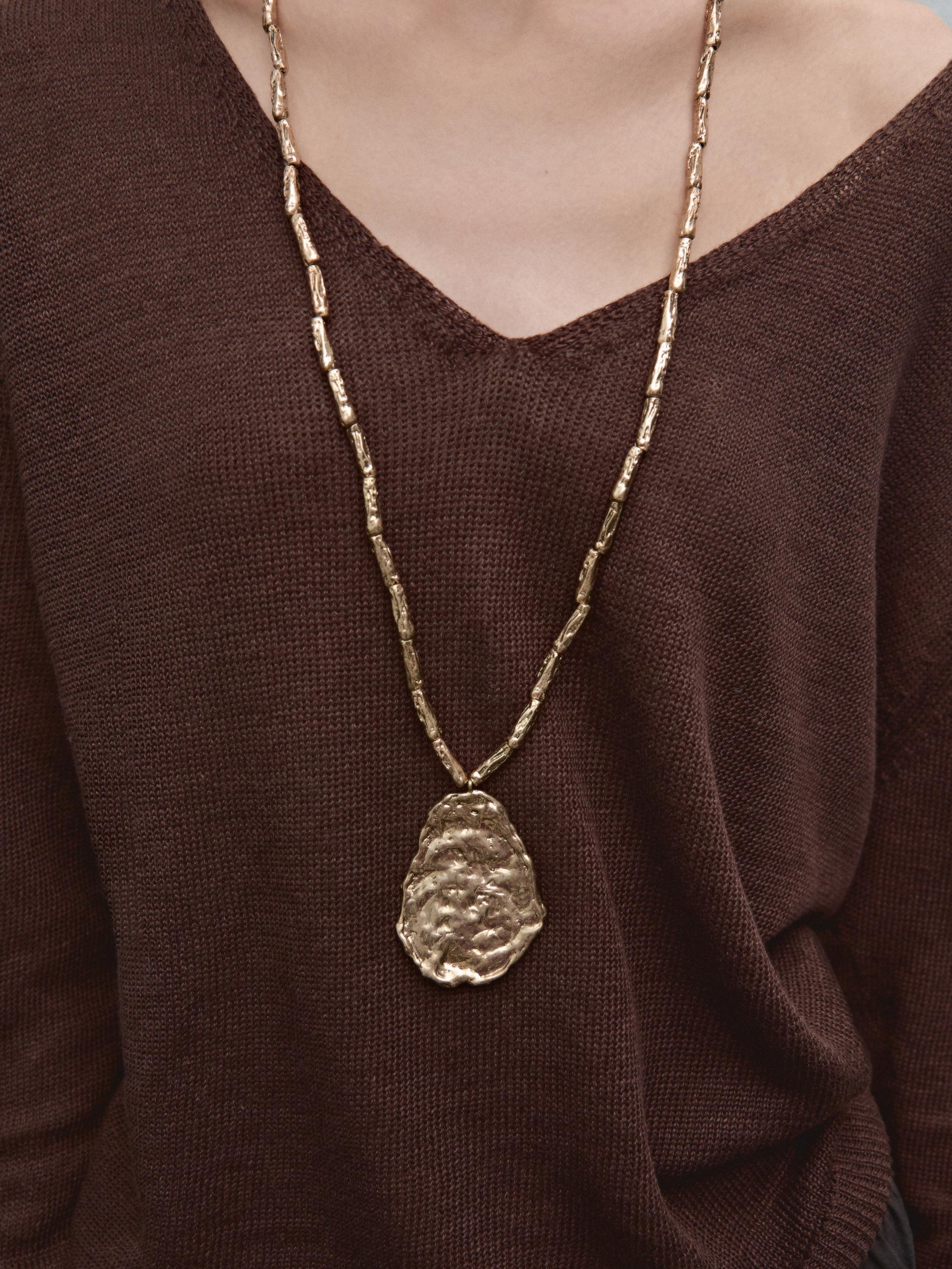 Long necklace with stone piece