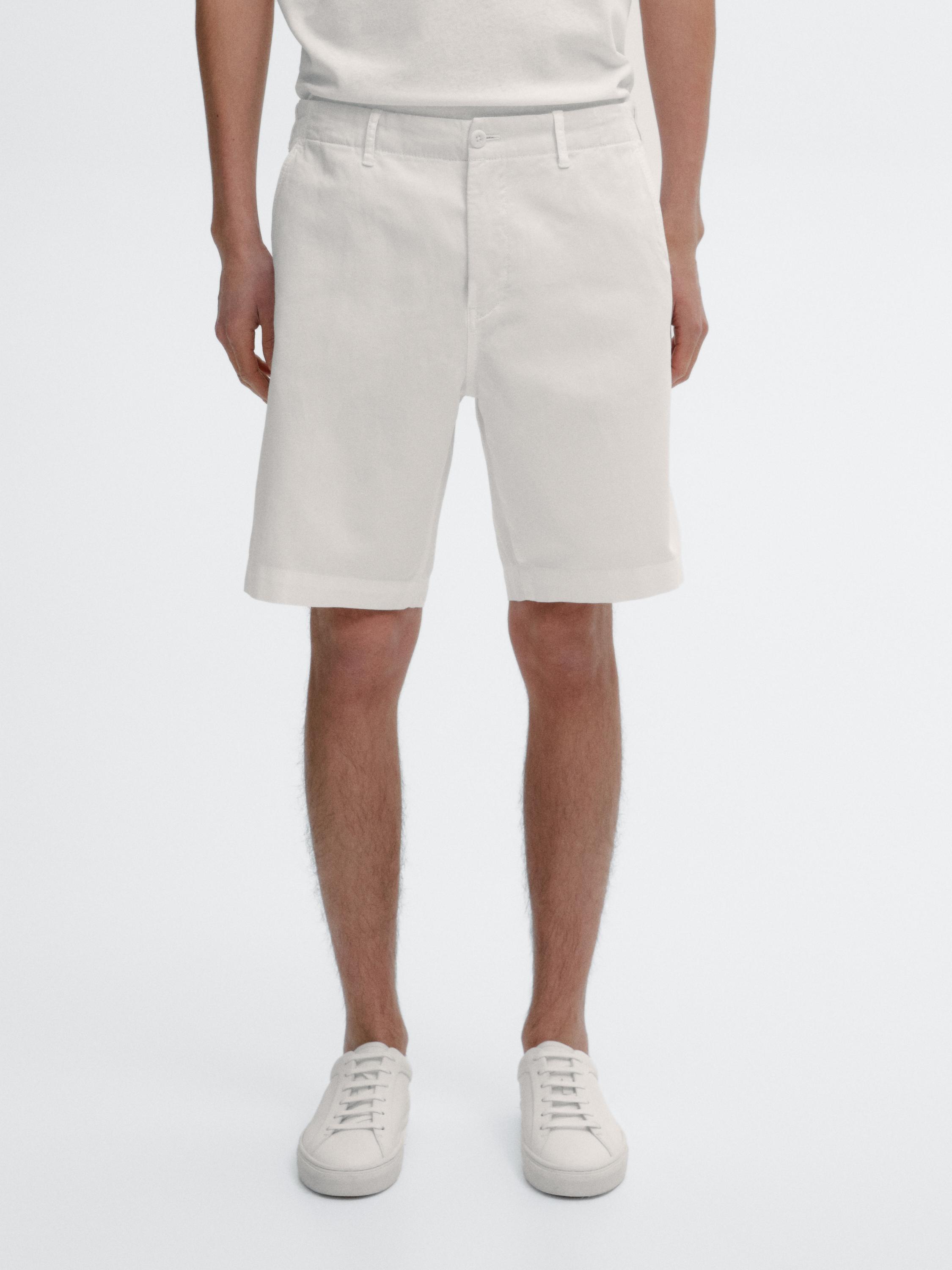 100% linen Bermuda shorts with side elastic detail