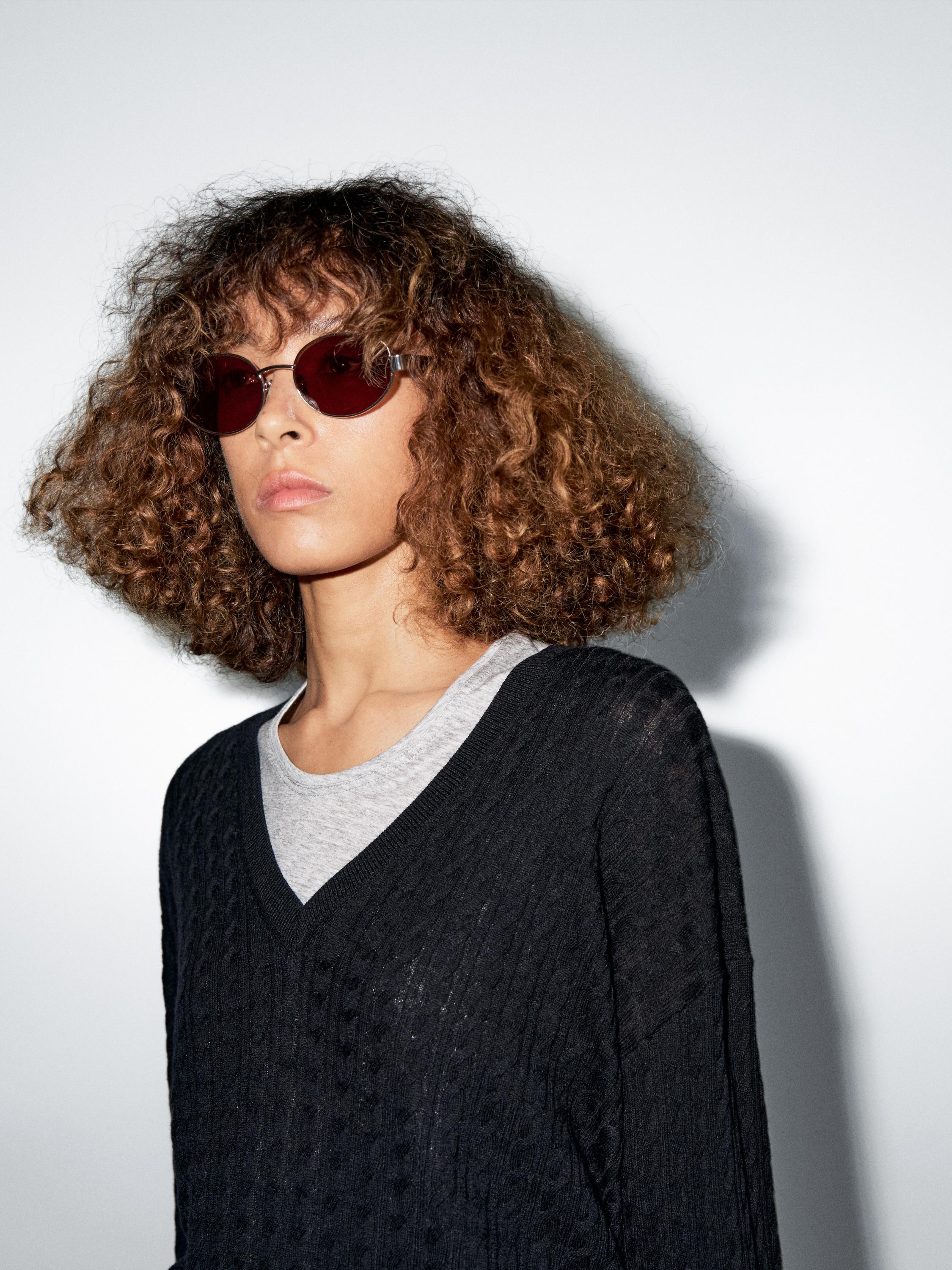 V-neck cable-knit sweater