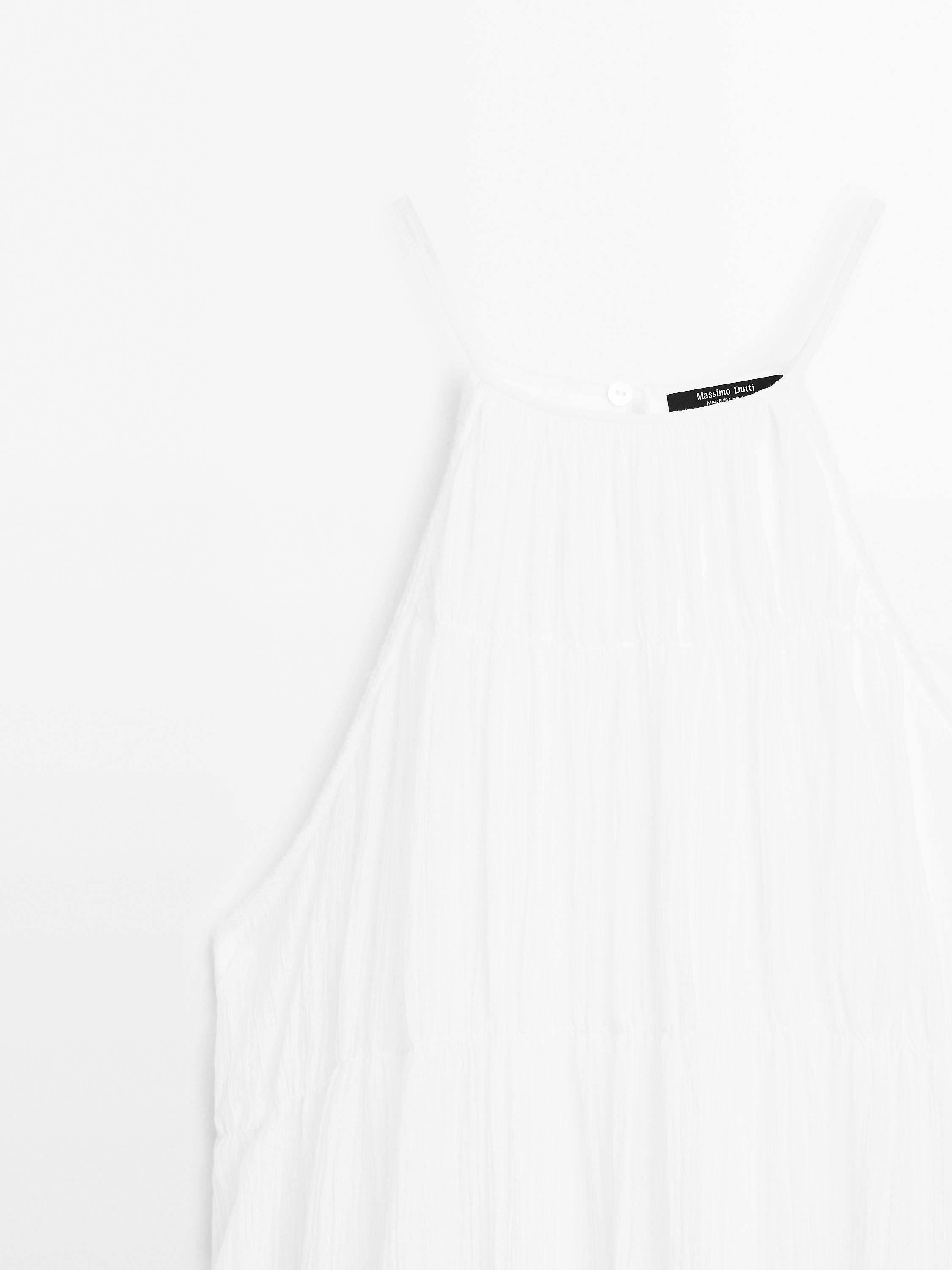 Long pleated dress with gathered detail