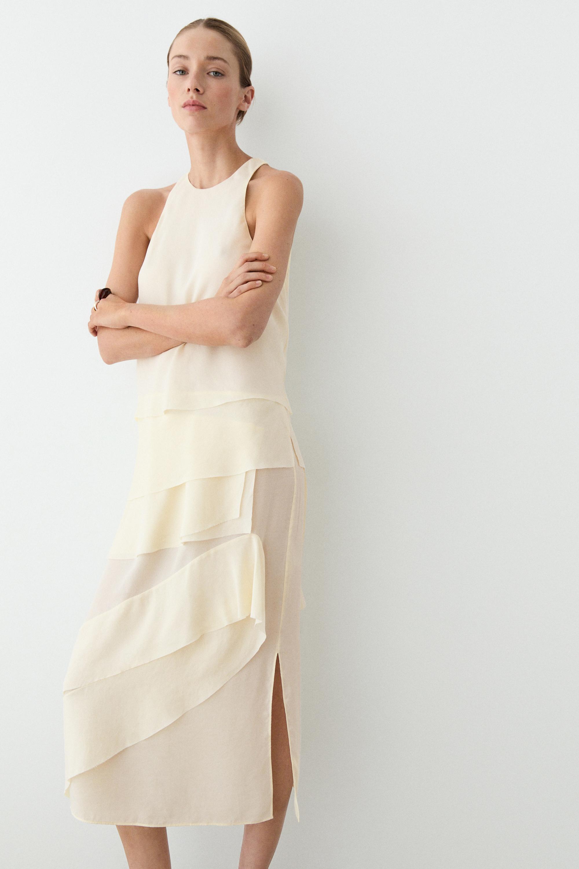 Flowing midi dress with ruffles — CREAM