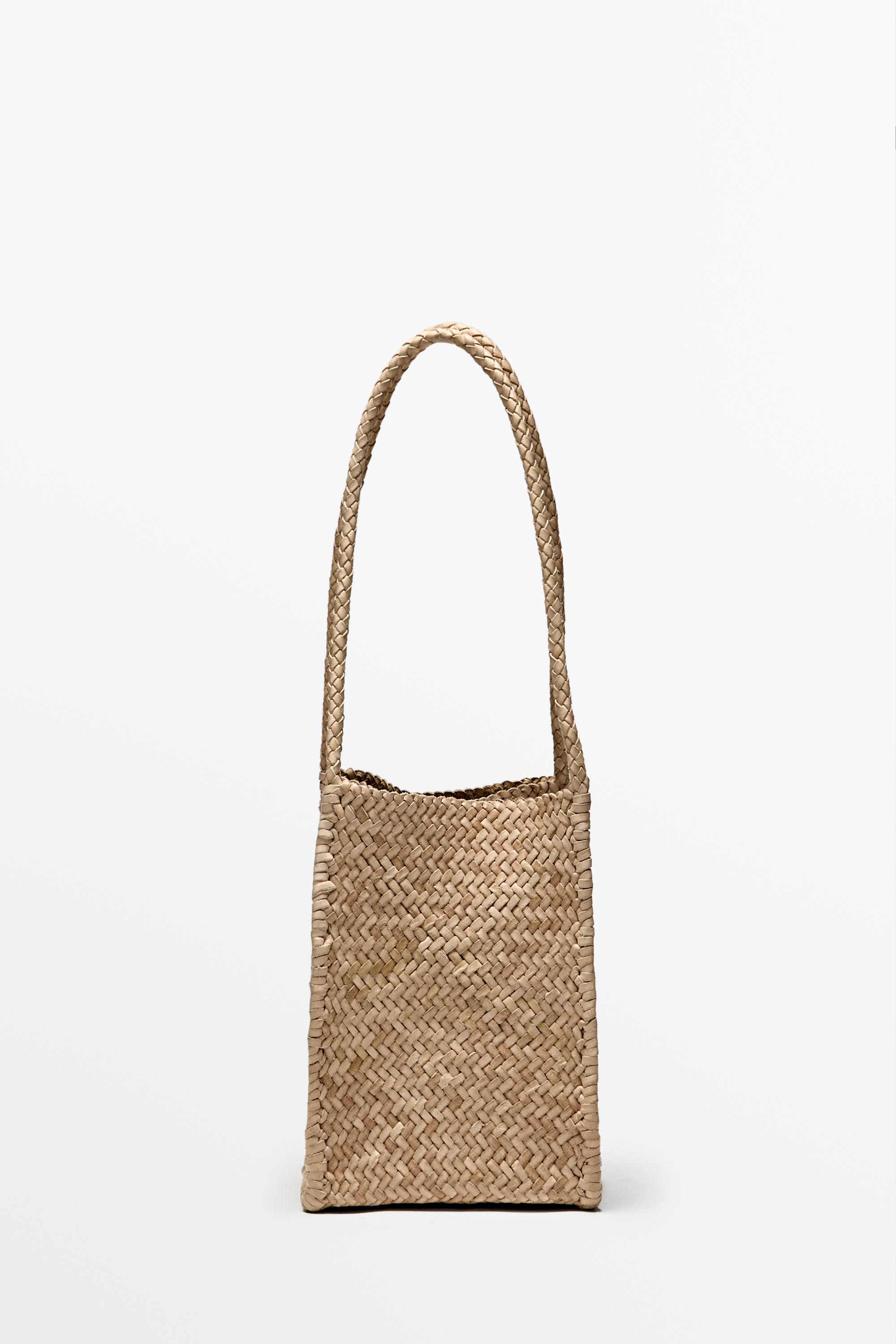 Nappa leather woven bucket bag — CREAM