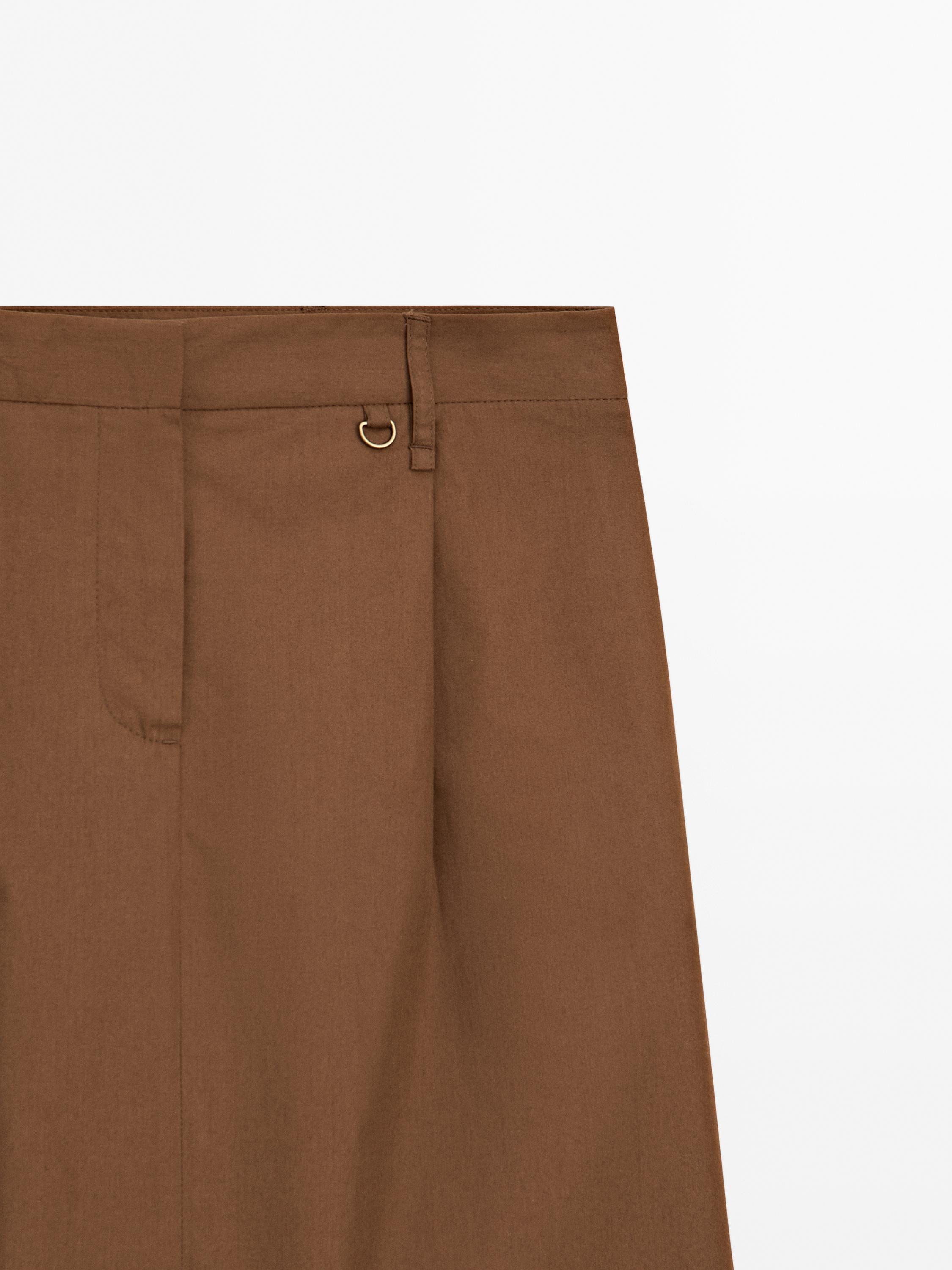 Midi sukňa s detailom v páse