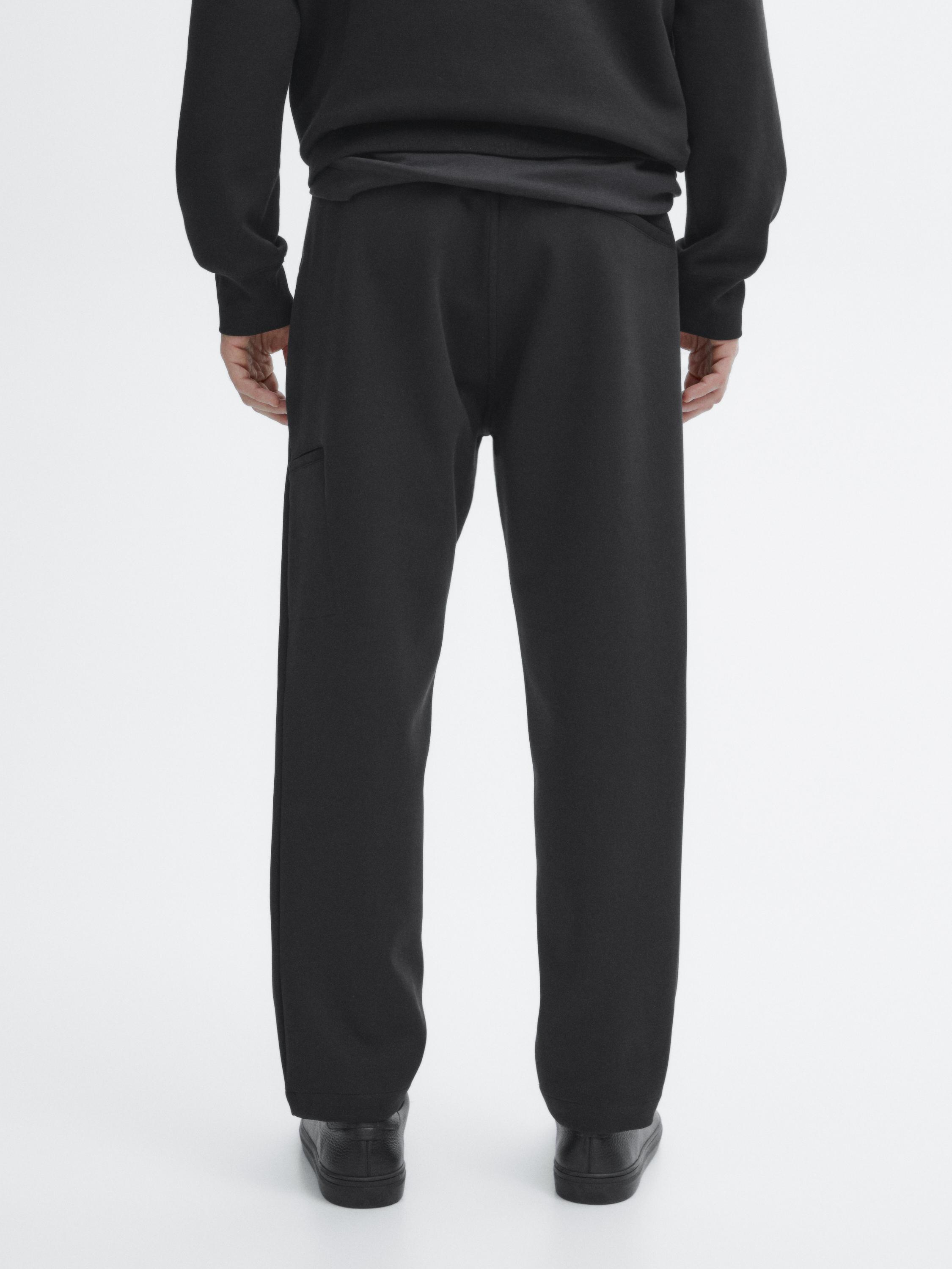 Trousers with side pocket detail