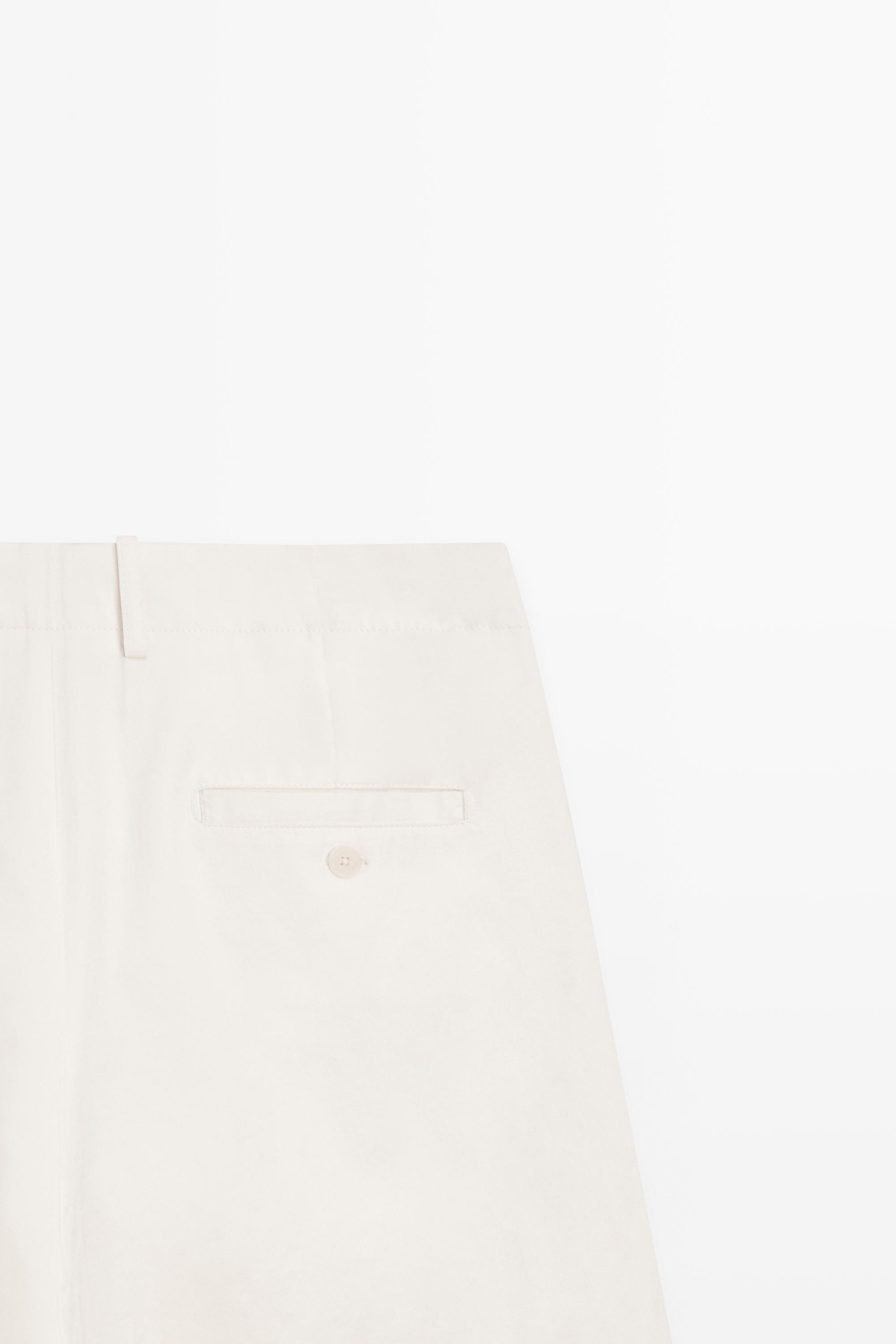 Pleated pants with crossover fastening detail - STUDIO — CREAM