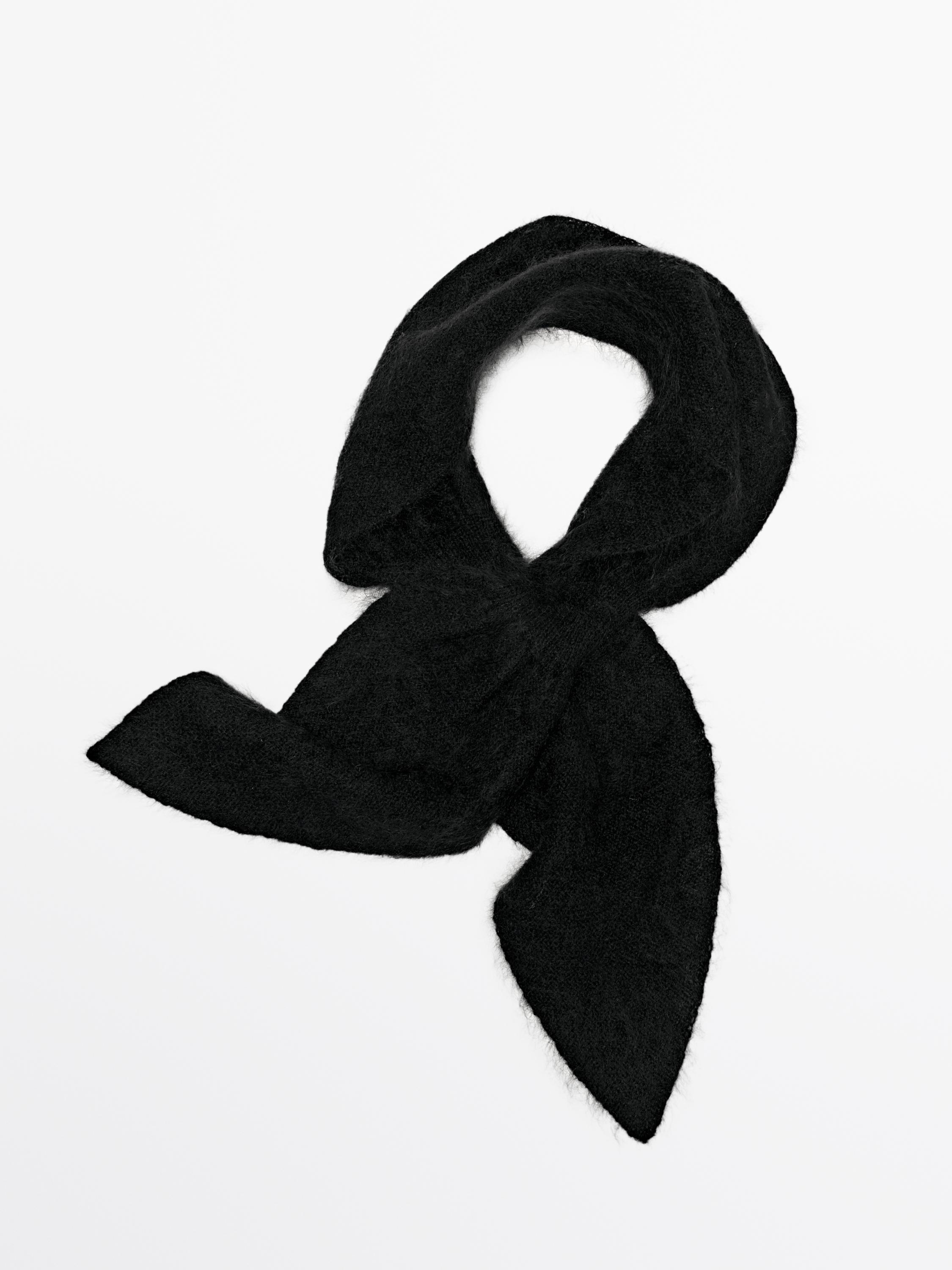 Stickad slips i 100 % kashmir med knytning