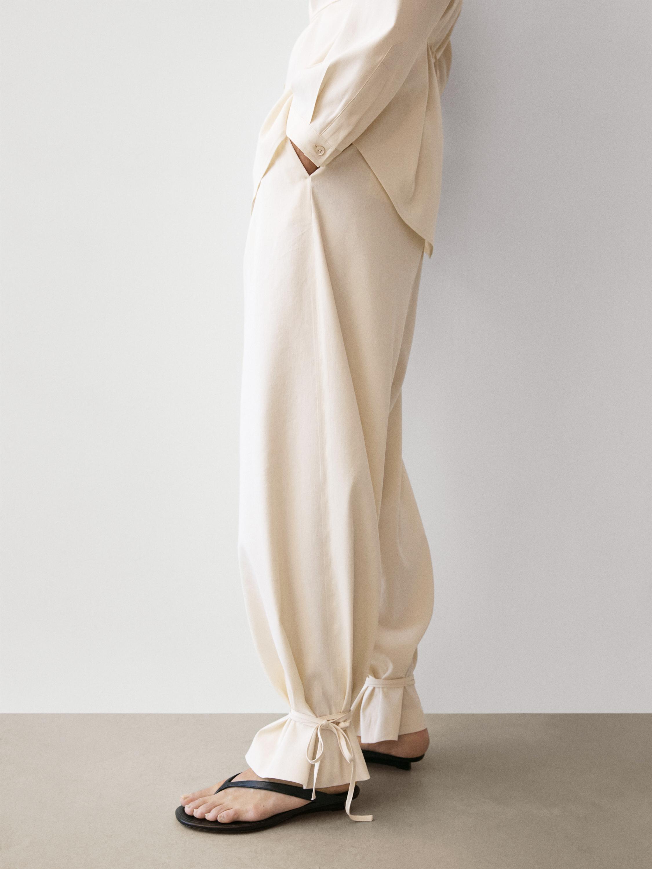 Flowing barrel fit trousers — CREAM