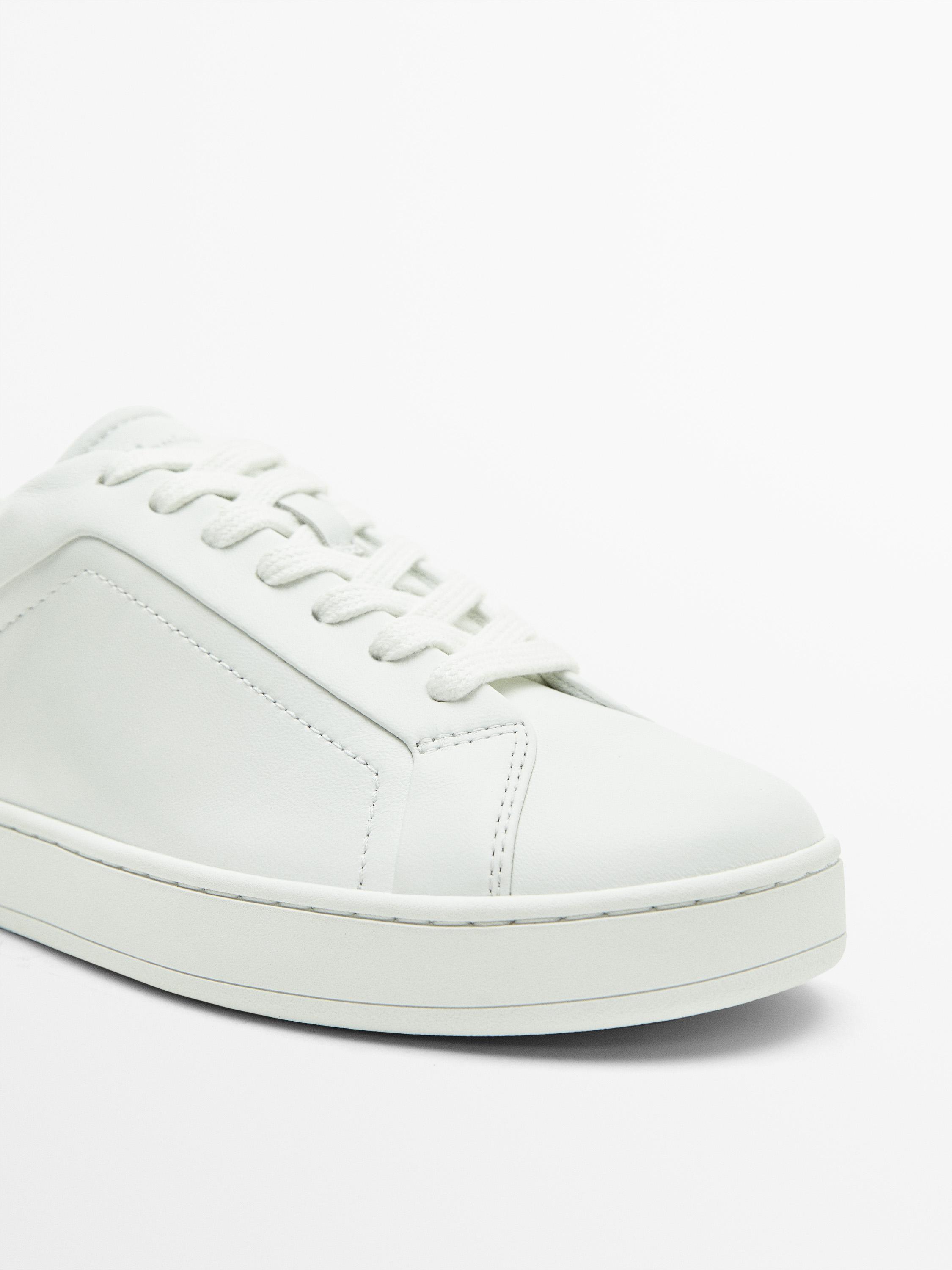 White leather trainers