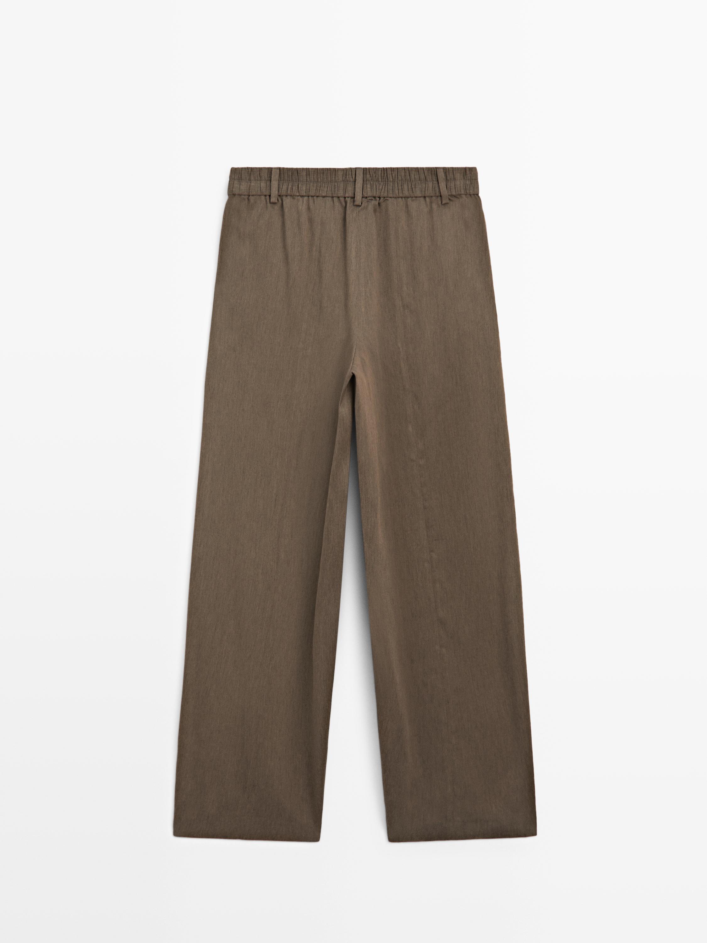 Flowing trousers with elasticated waistband — DARK GREEN
