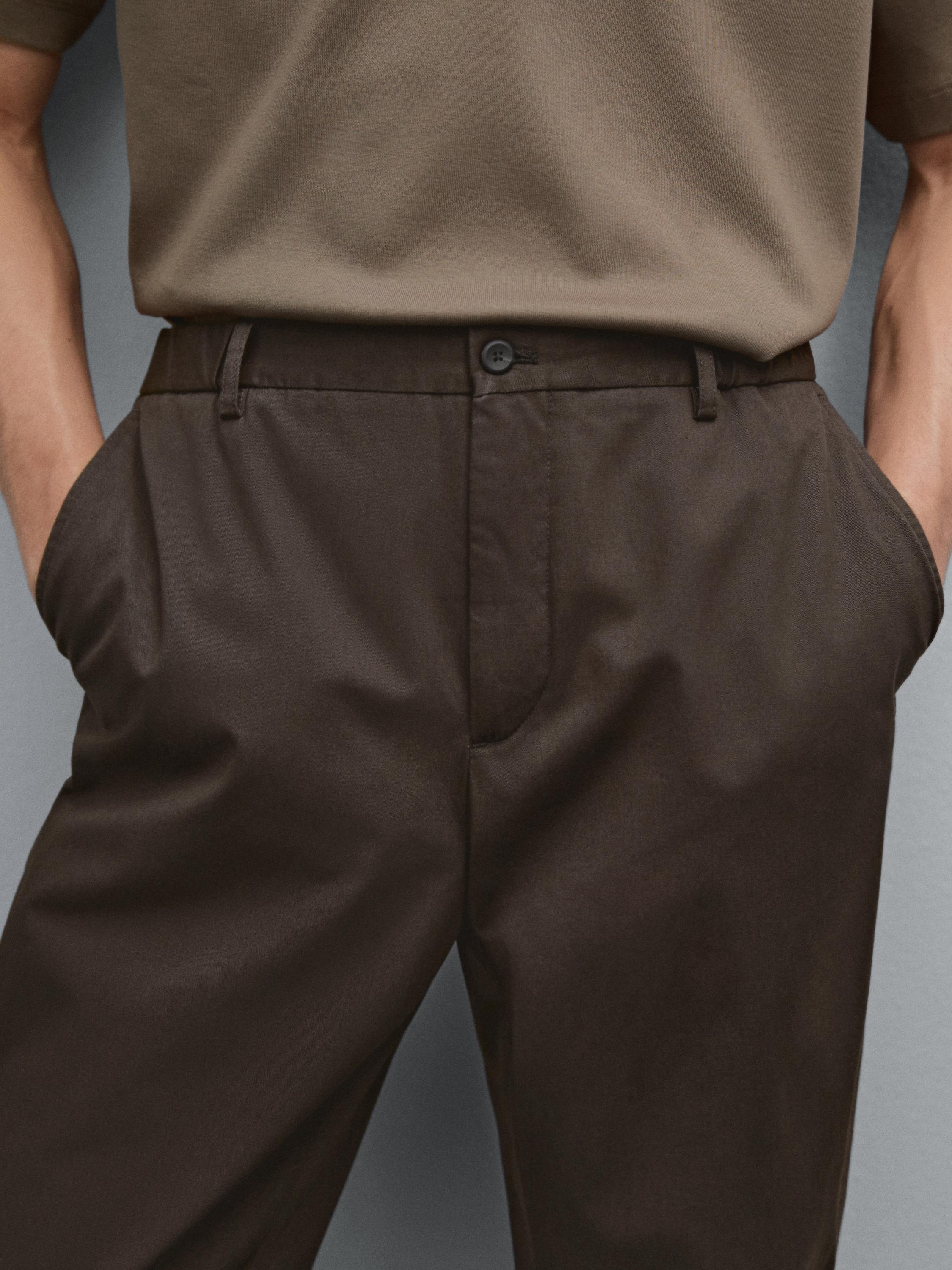 Pantalon tapered élastique sur le côté