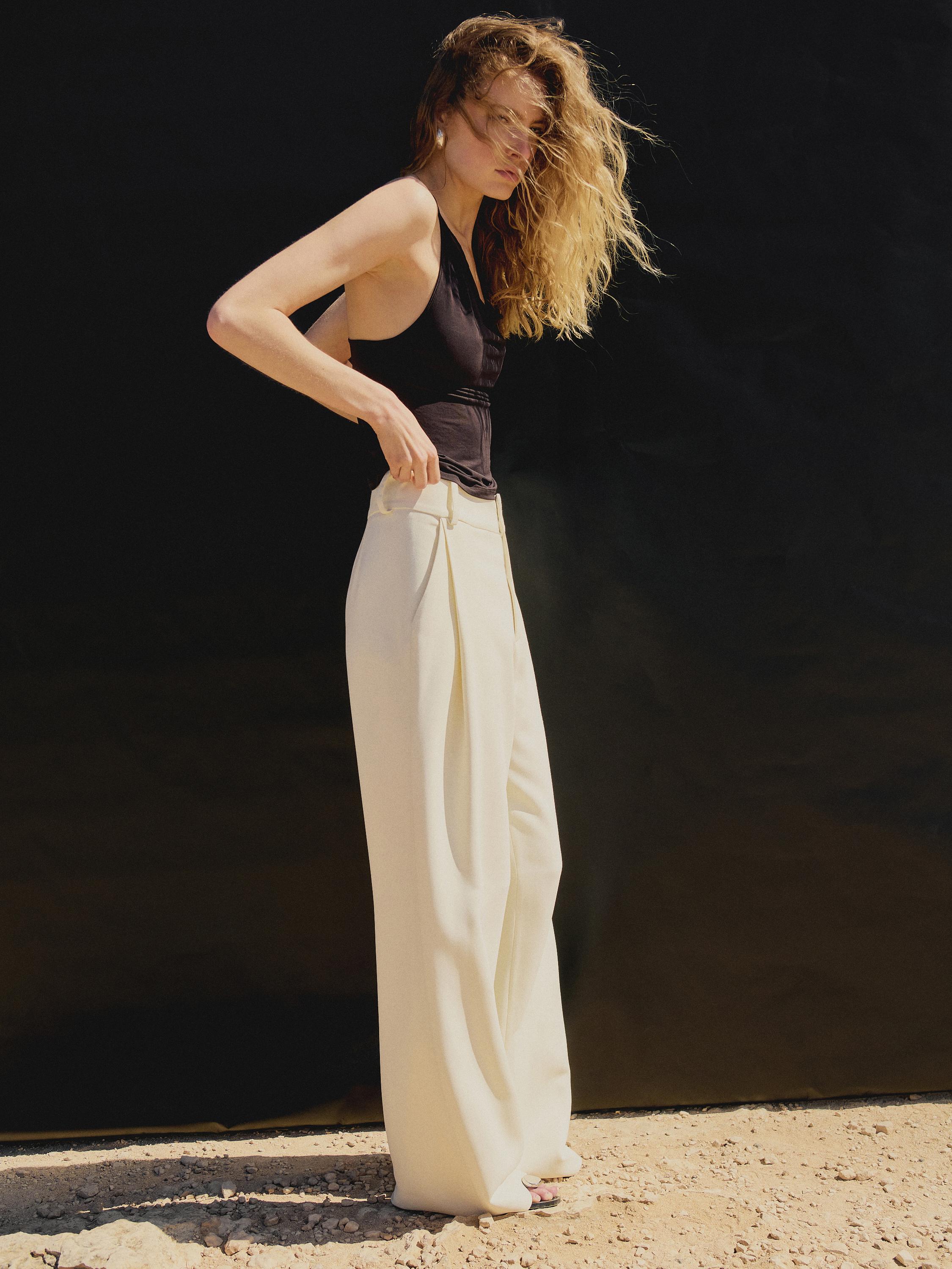 Flowing strappy top with crossover back