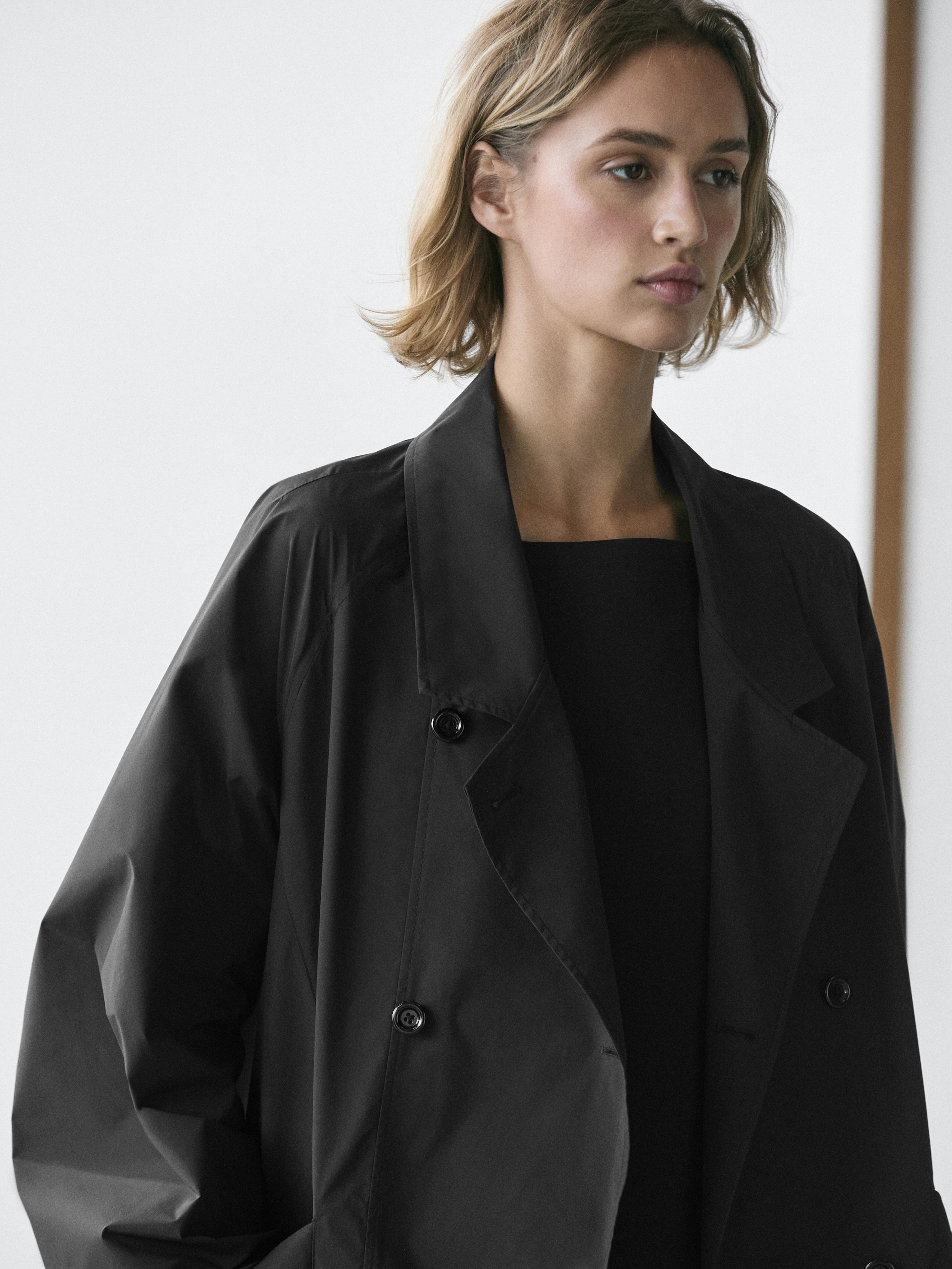 Double-breasted technical trench coat