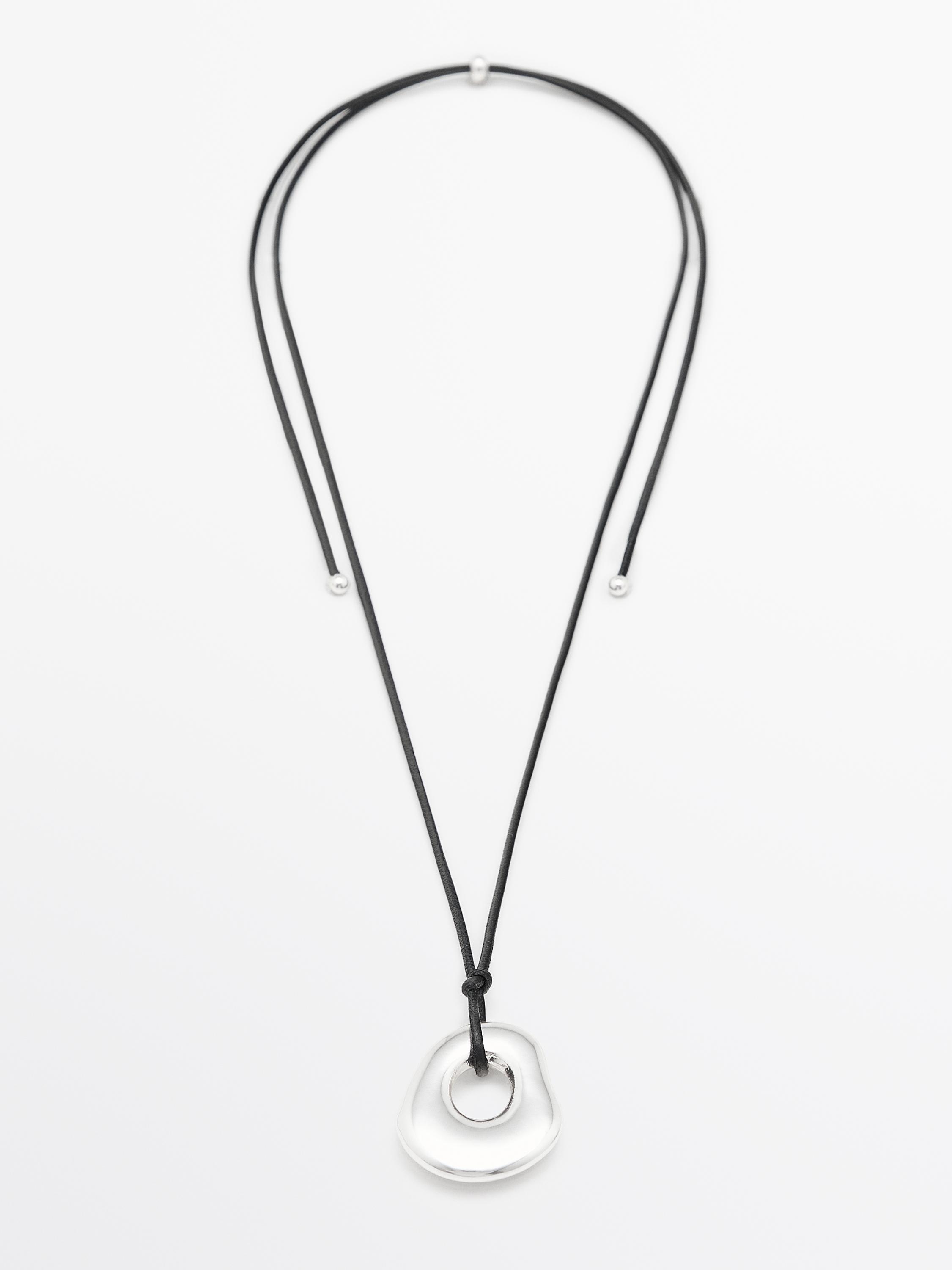 Leather cord necklace with piece