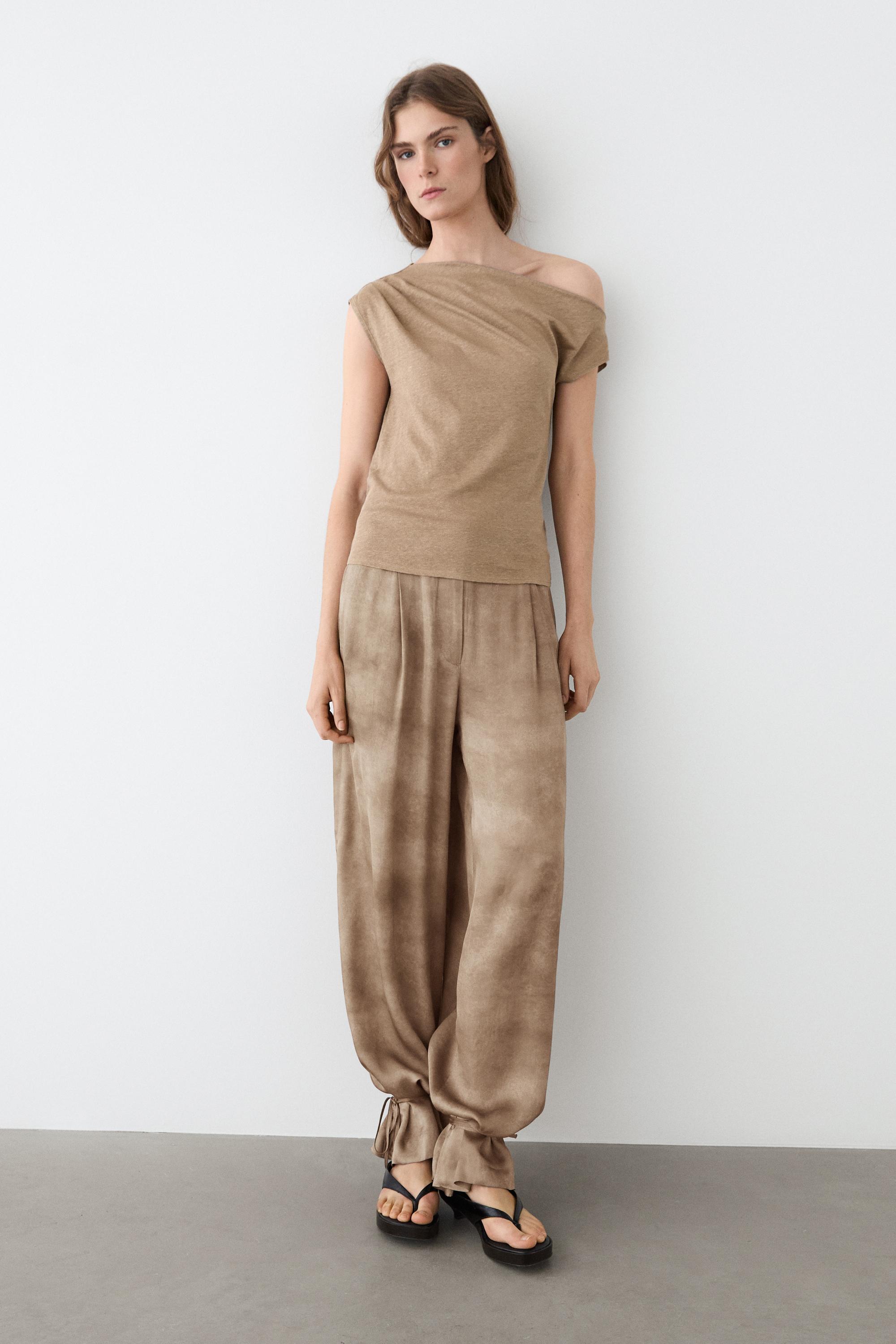Flowing pants with tie-detail hem — BEIGE