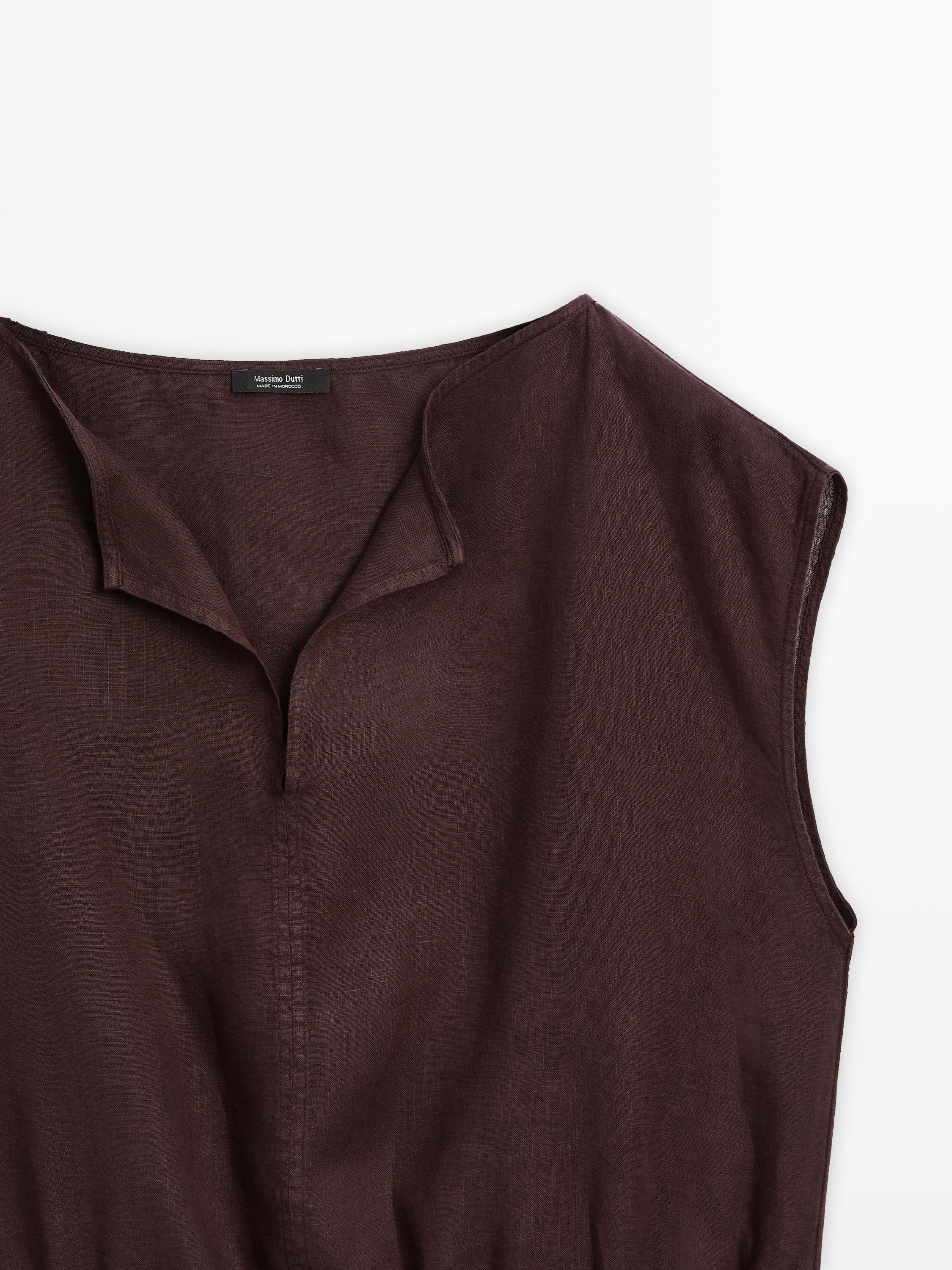 Linen blouse with elasticated hem