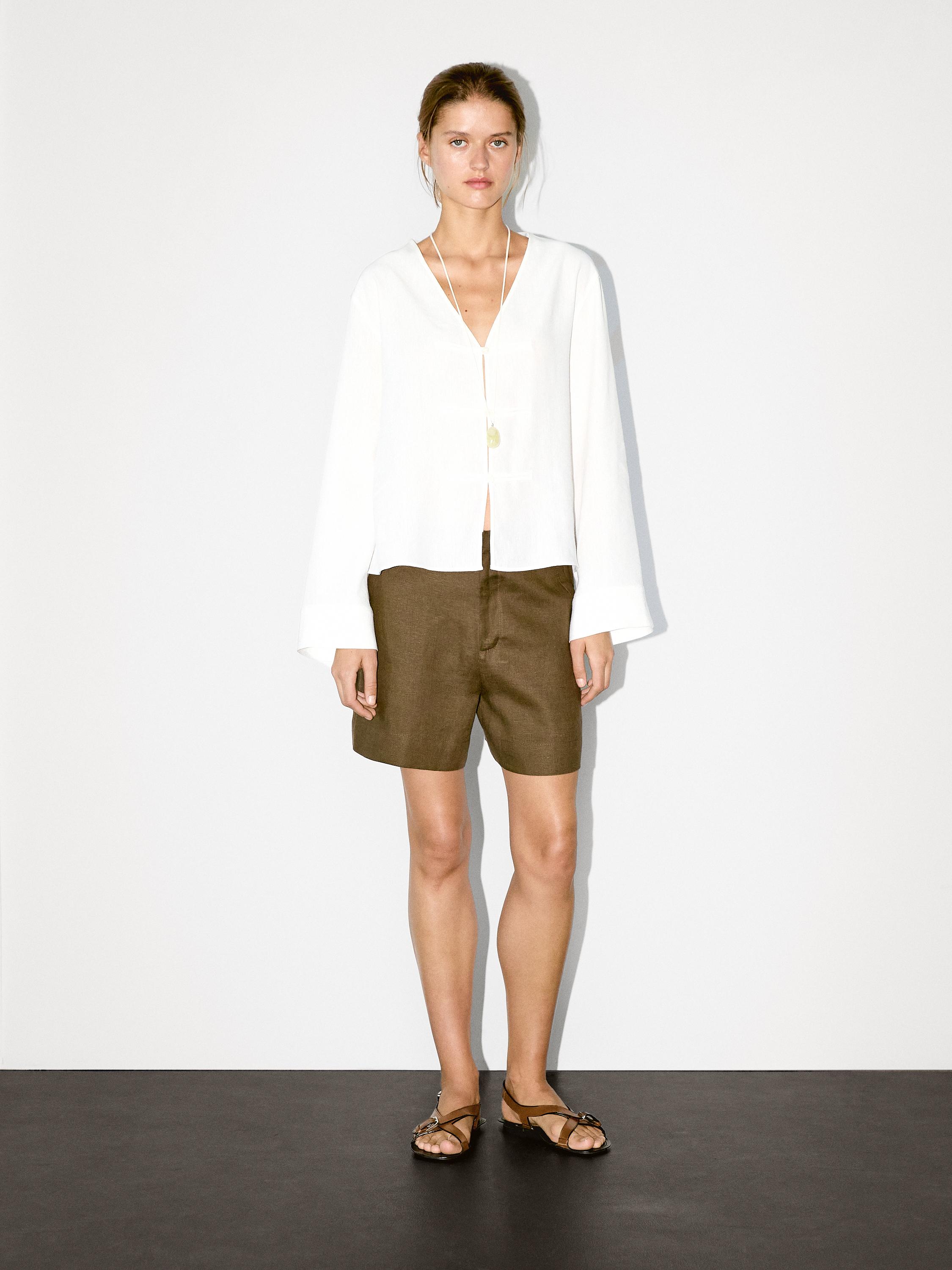 Flowing linen blend blouse with V-neckline