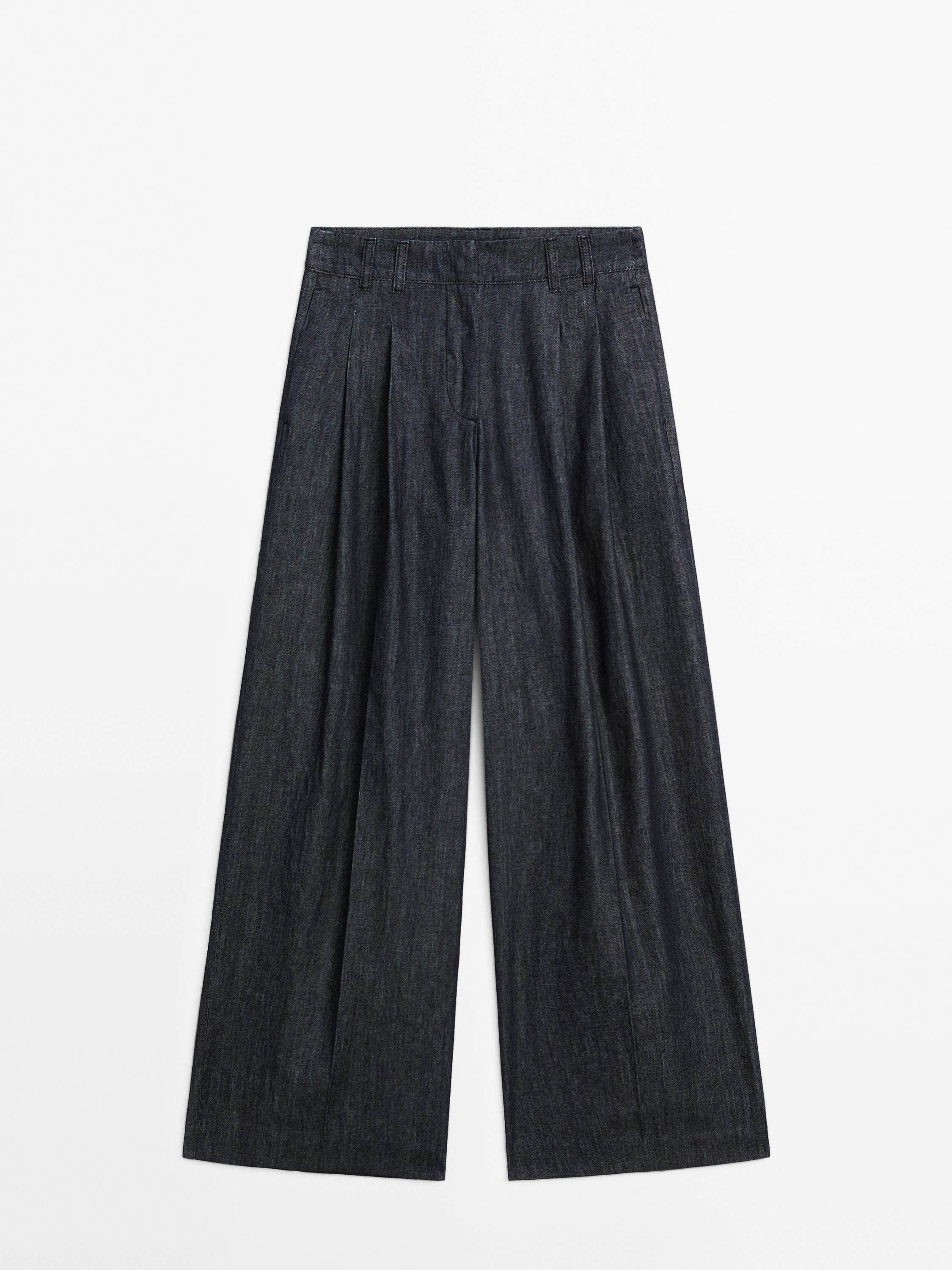 Lekkie jeansy z szerokimi nogawkami i wysokim stanem