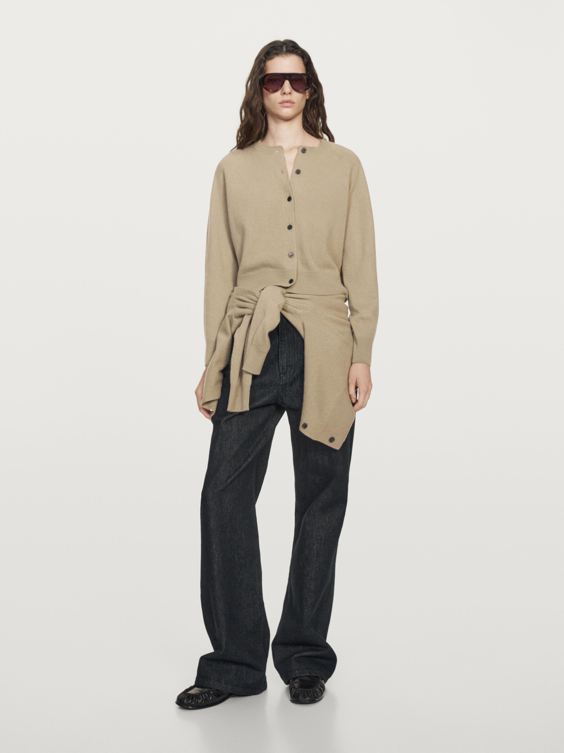 Short knit cardigan with raglan sleeves