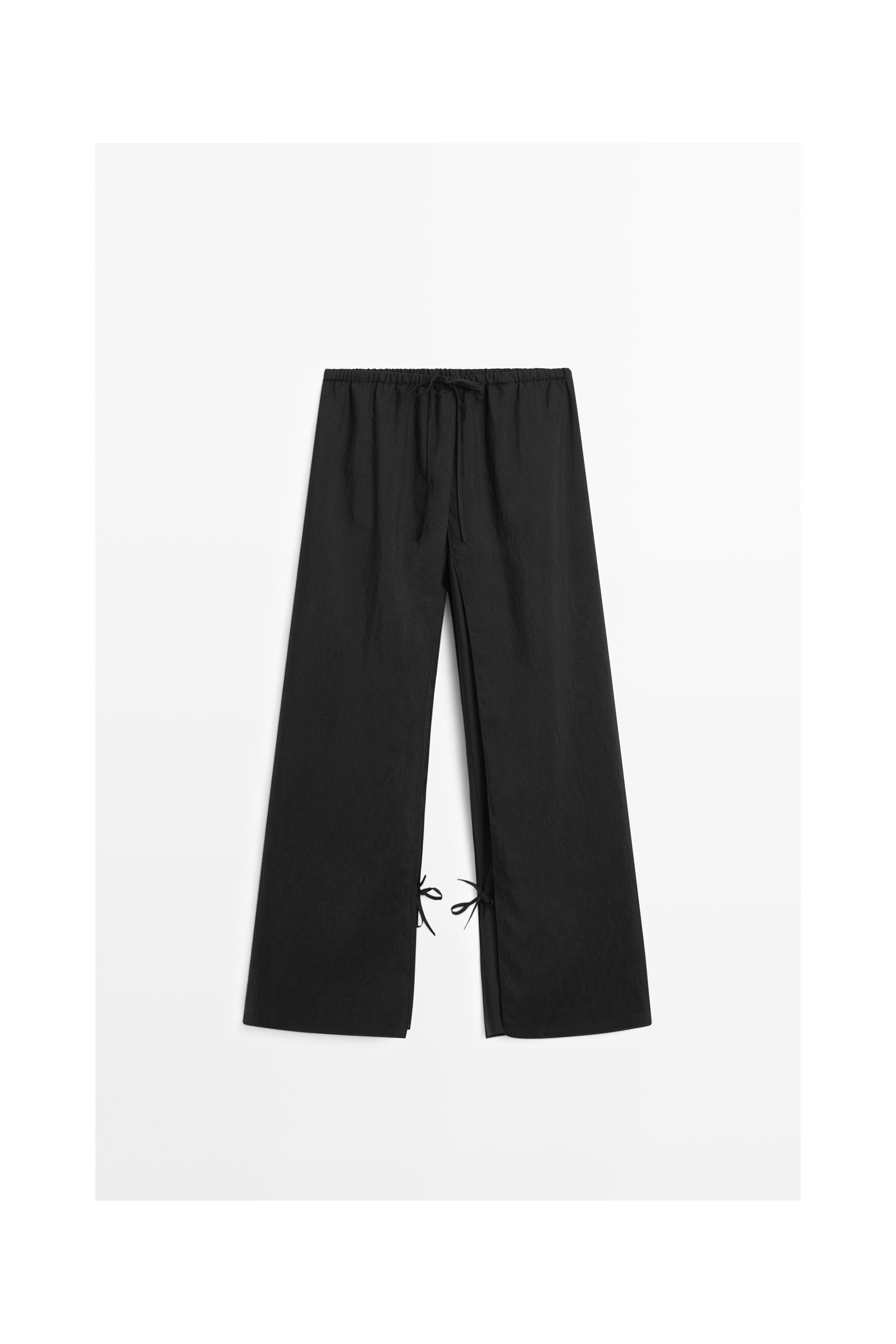 Double-layer pants with tie detail — BLACK