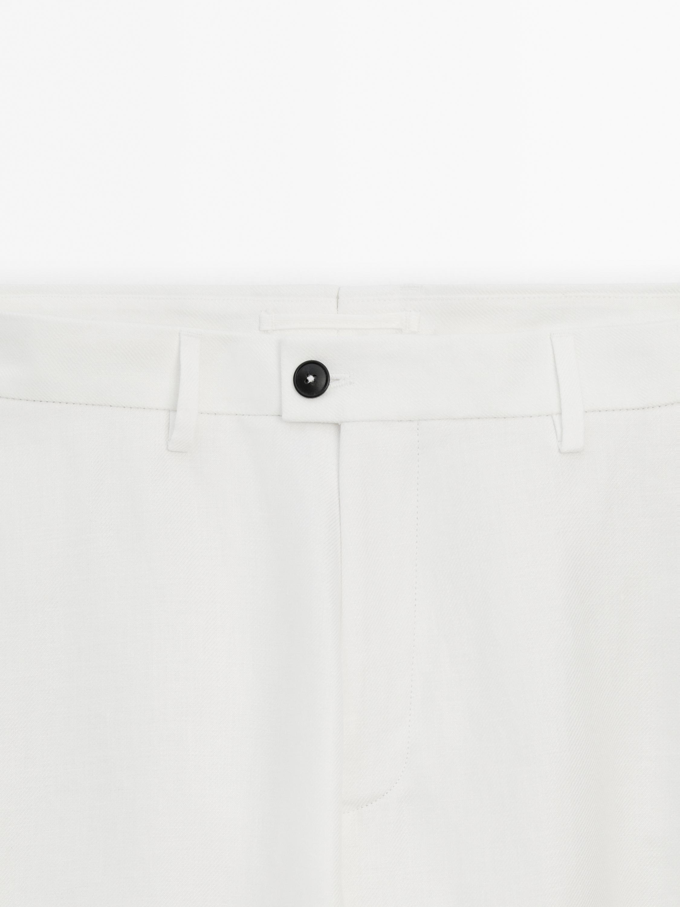 Pantalón traje 100% lino