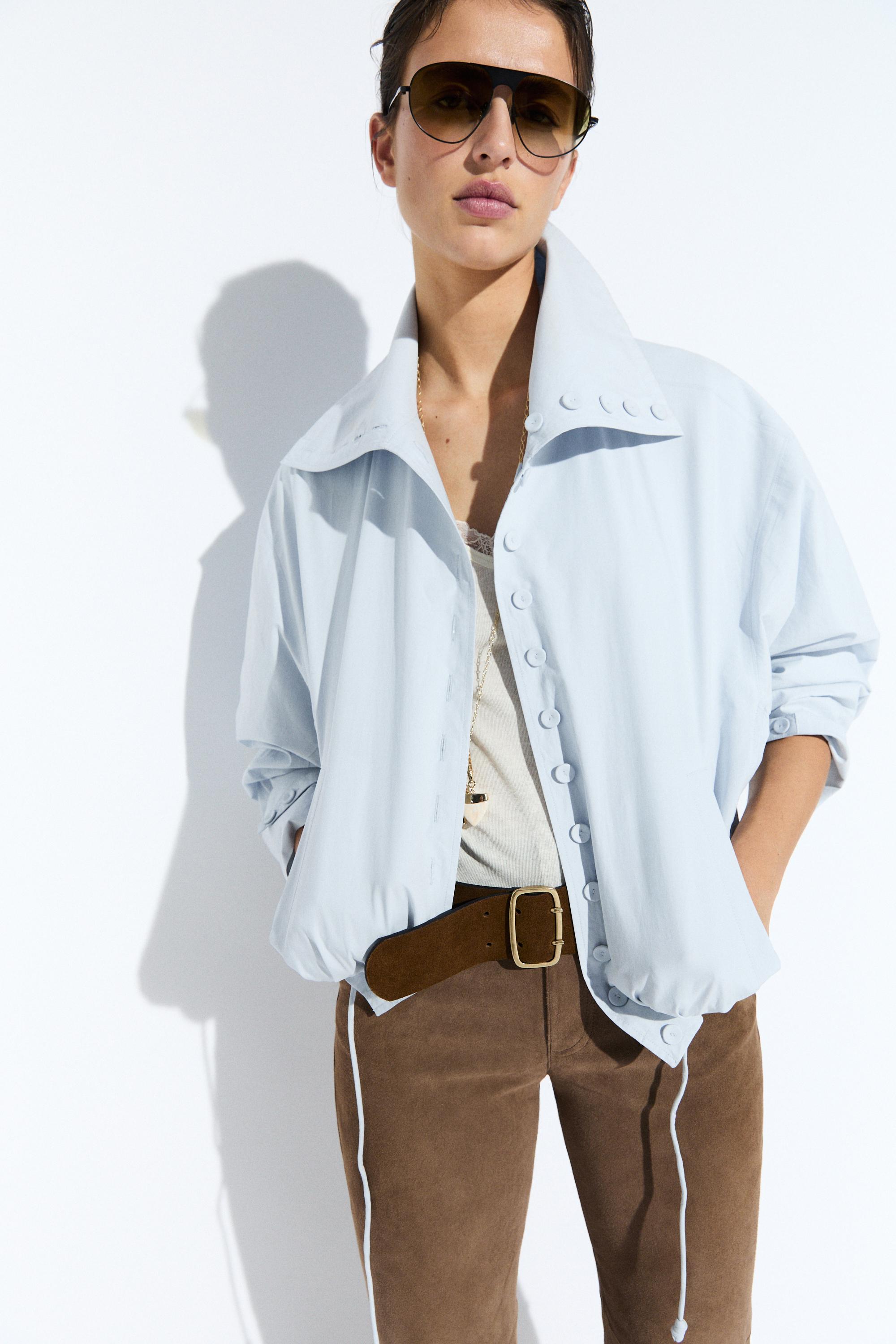 High collar bomber jacket with pocket details — Light blue